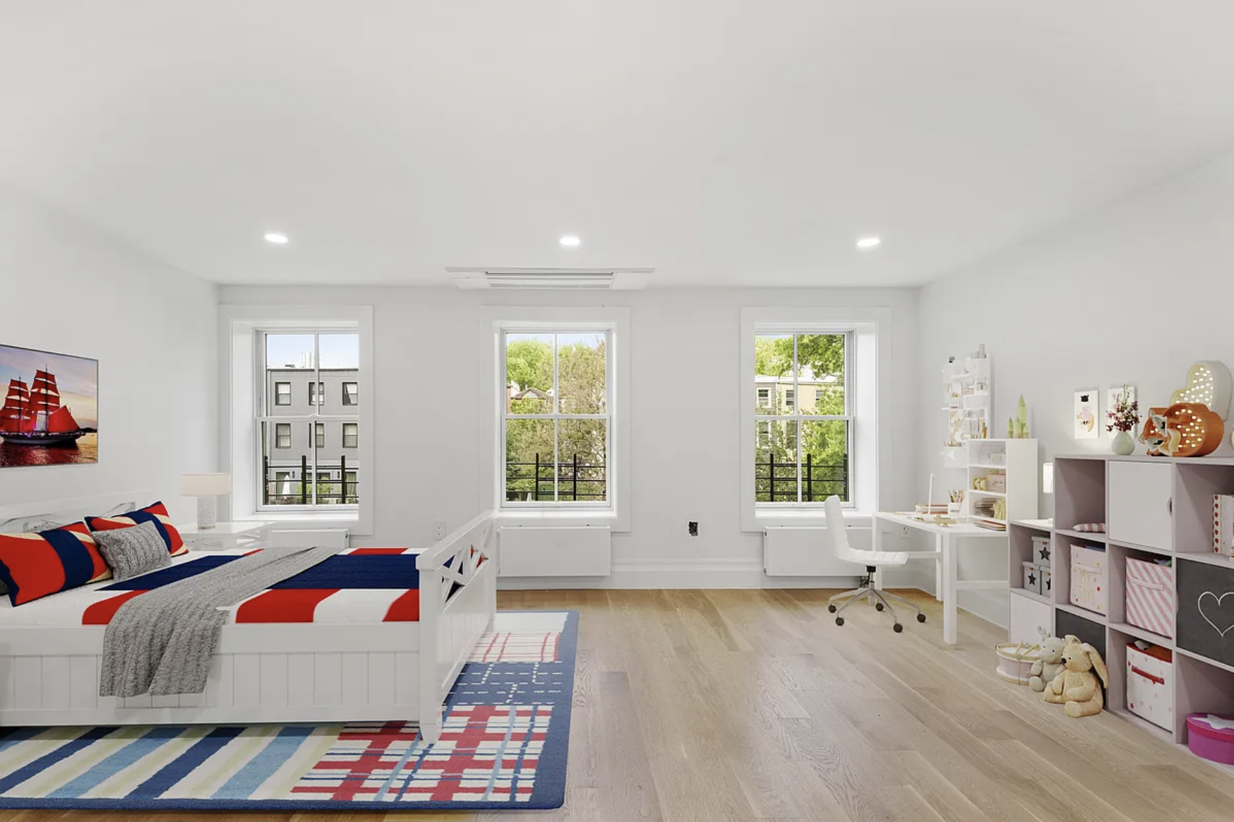 169 Putnam Avenue, Unit 2 Brooklyn, NY 11216 - Photo 5 of 10 a bedroom with furniture and a window