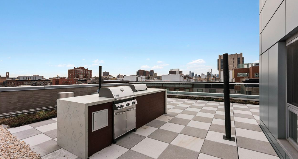 171 West 131st Street, Unit 519 Manhattan, NY 10027 - Photo 8 of 10 a view of a terrace with seating space