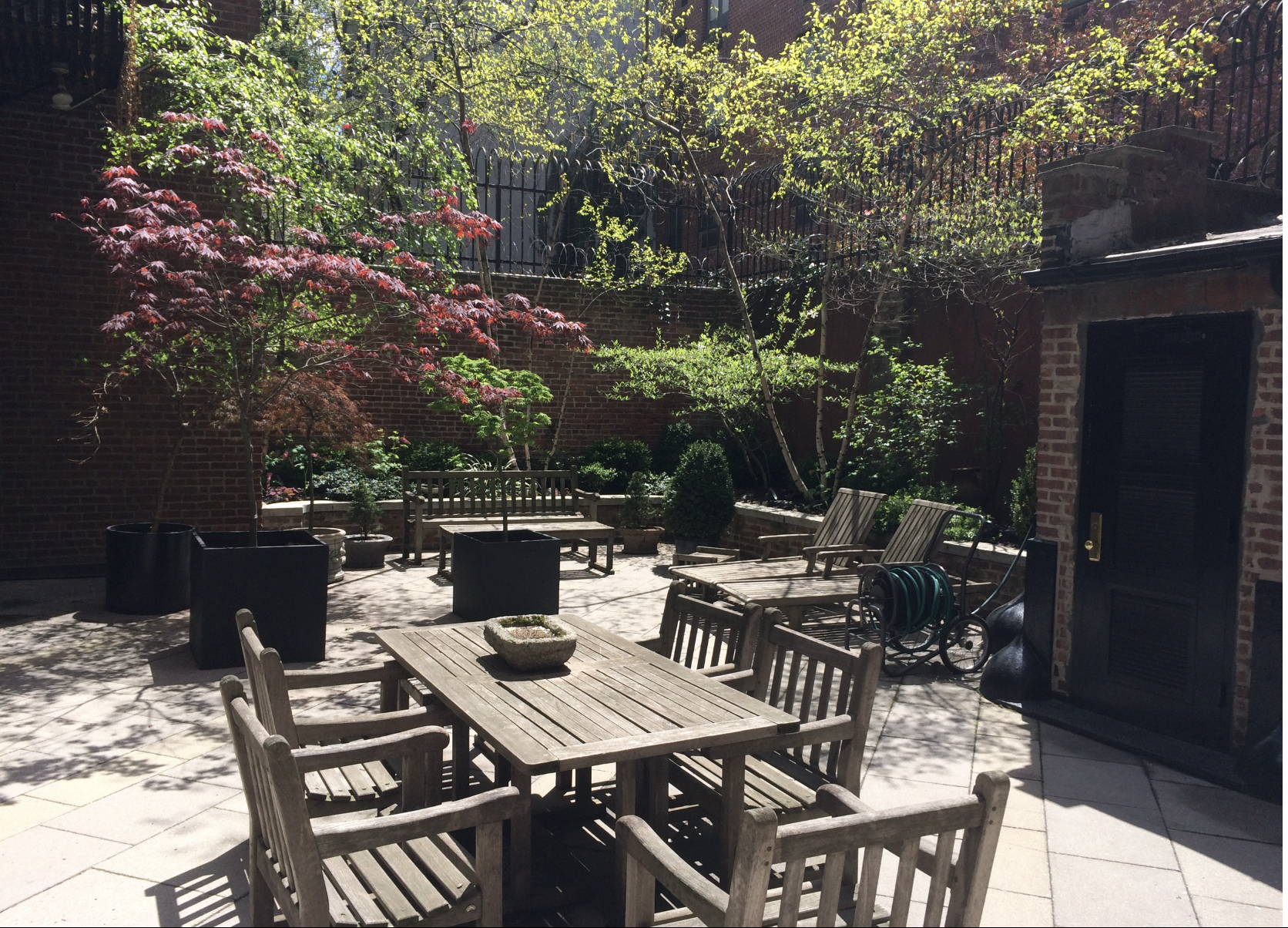 454 West 46th Street, Unit 5CS Manhattan, NY 10036 - Photo 21 of 25 a view of a dinning table and chairs in the patio