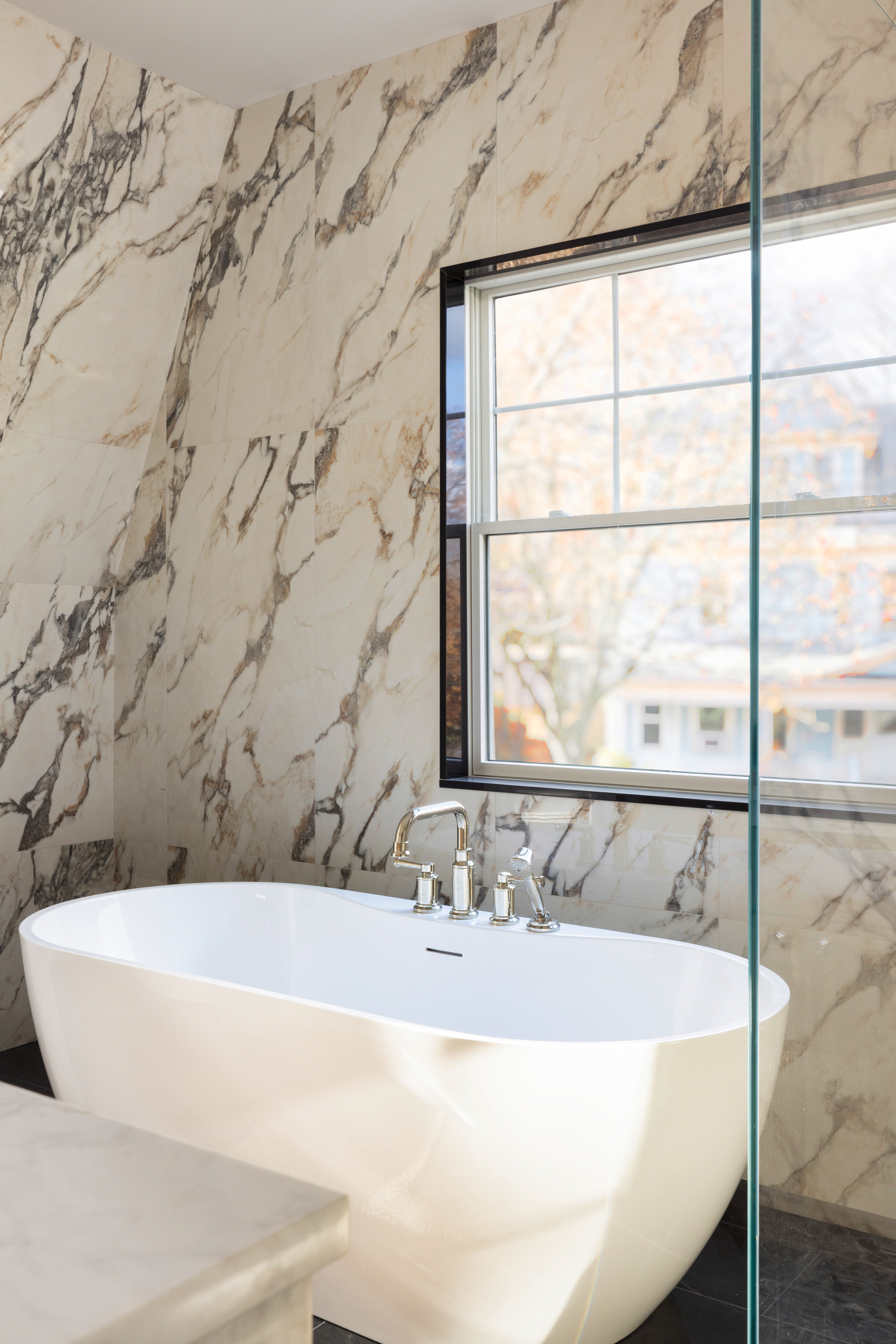 85 Naples Road, Unit 1 Brookline, MA 02446 - Photo 21 of 32 a bathroom with a bathtub and window