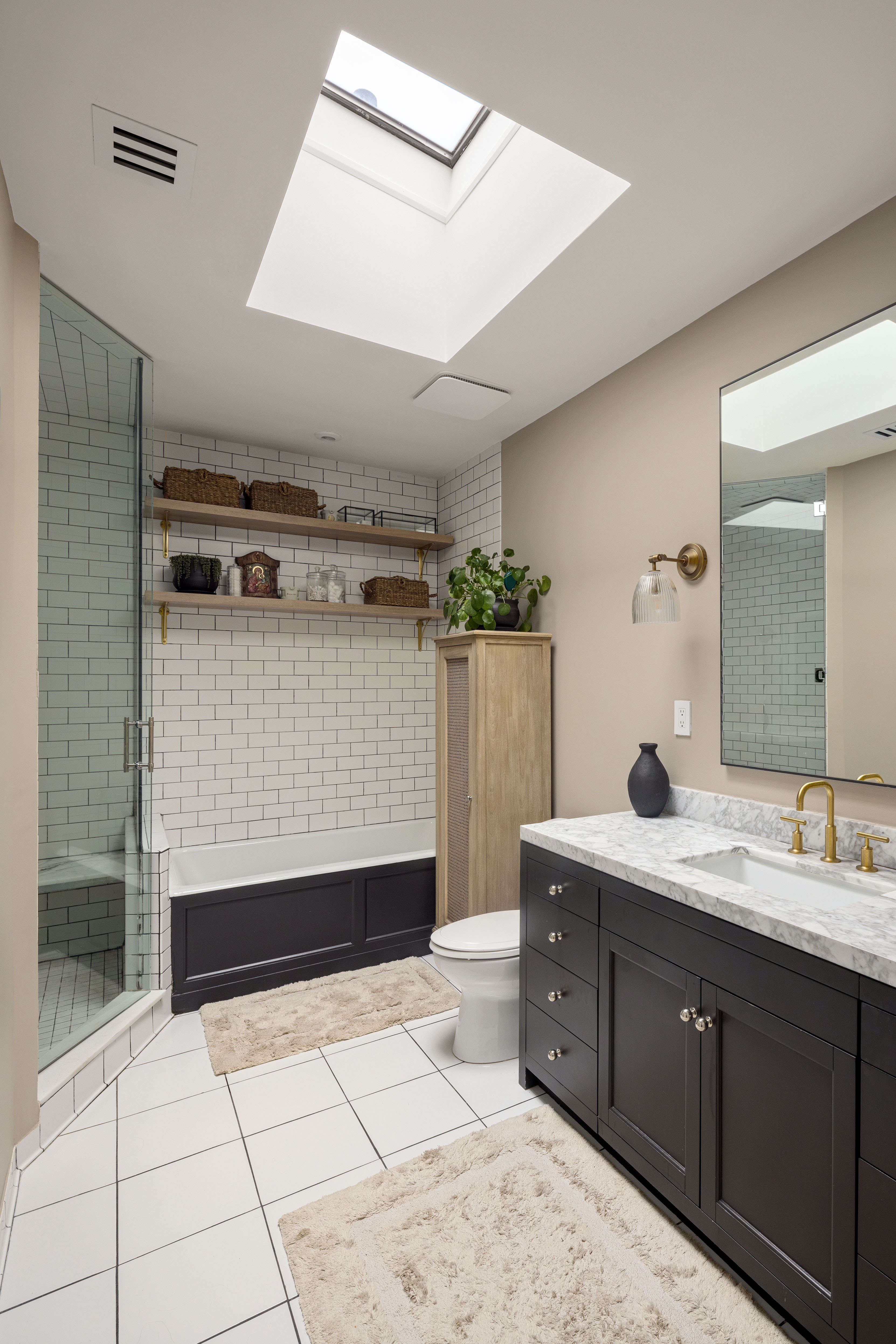 309 Pacific Street Brooklyn, NY 11201 - Photo 12 of 22 a bathroom with a sink a toilet and mirror