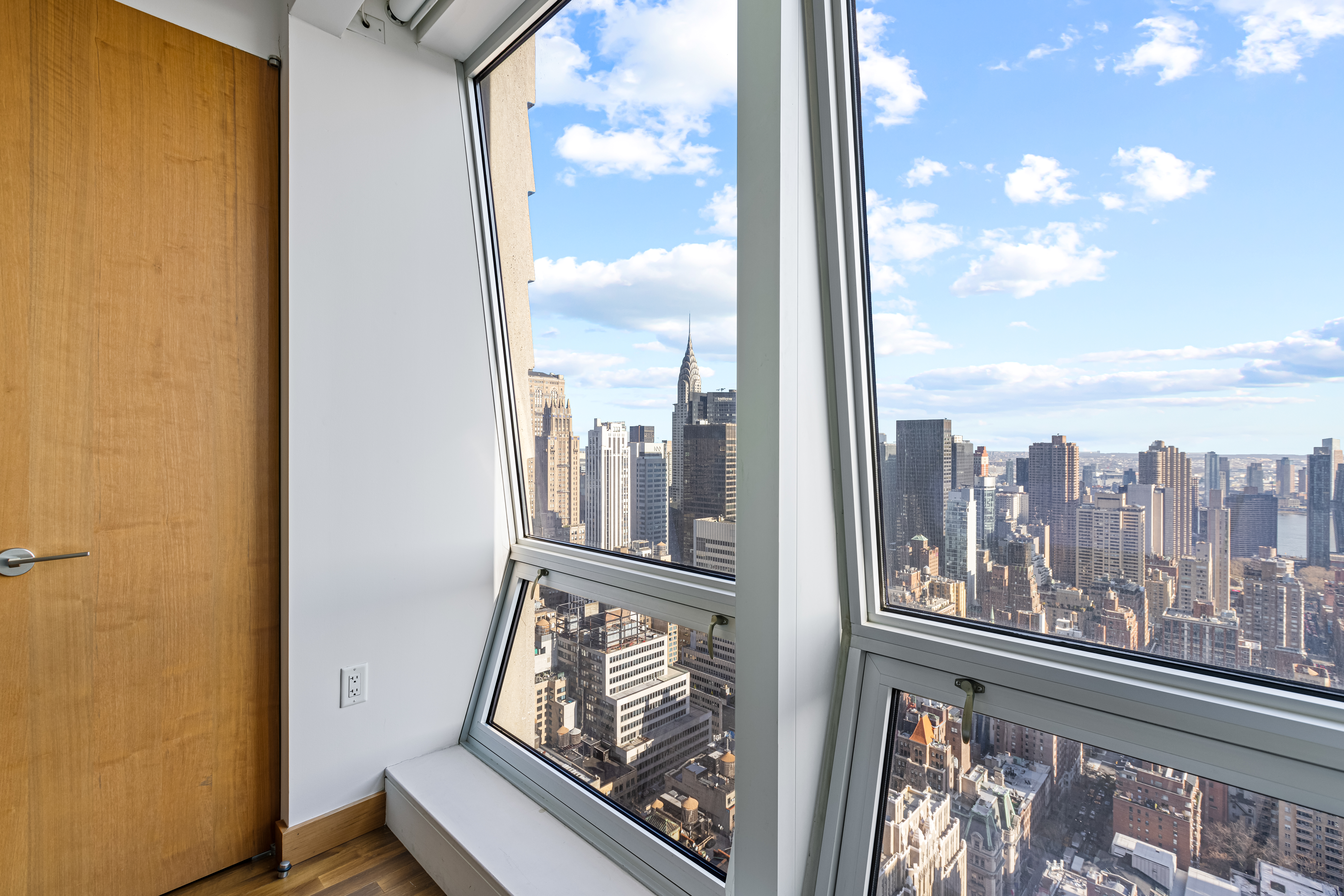400 5th Avenue, Unit 49C Manhattan, NY 10018 - Photo 7 of 21 a view of a balcony with an outdoor space