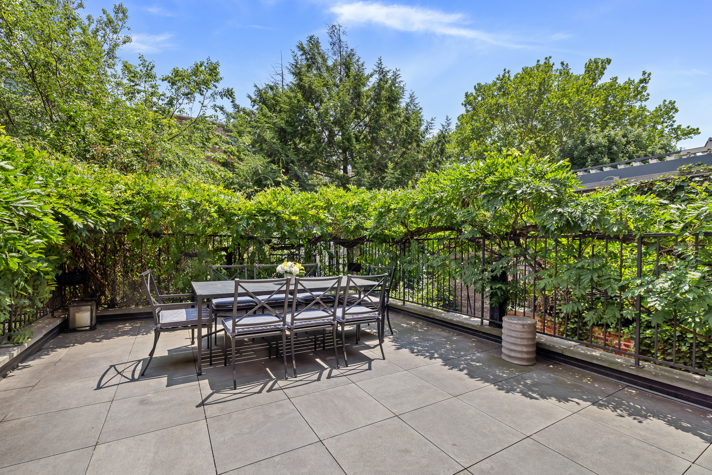 13 Garden Place, Unit B Brooklyn, NY 11201 - Photo 6 of 22 a view of a patio with table and chairs and potted plants