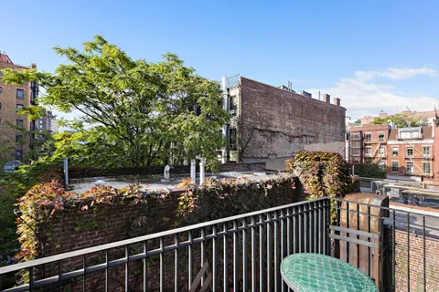 a view of a balcony with an outdoor space