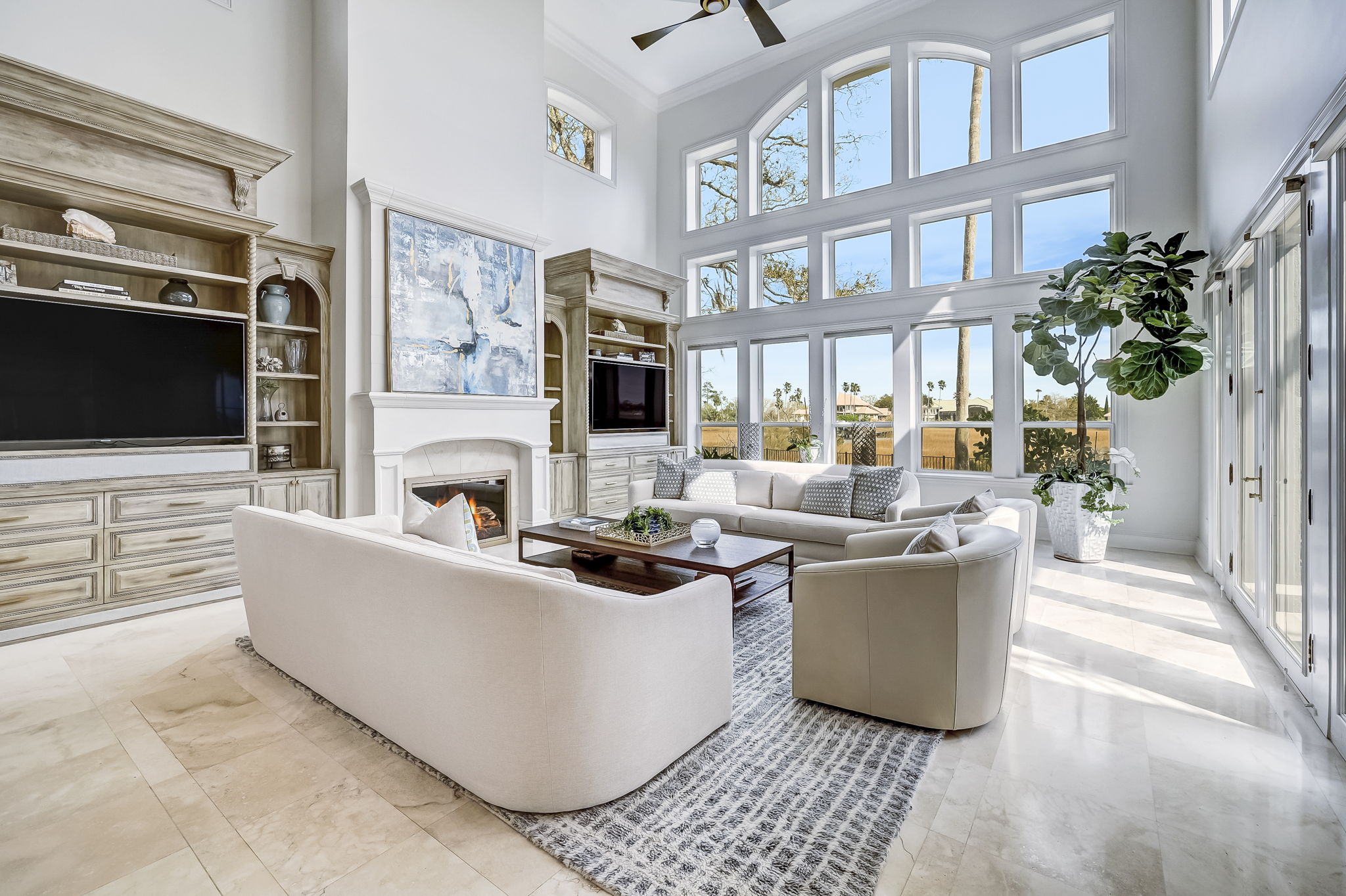 24624 Harbour View Drive Ponte Vedra Beach, FL 32082 - Photo 37 of 186 a living room with fireplace furniture and a flat screen tv