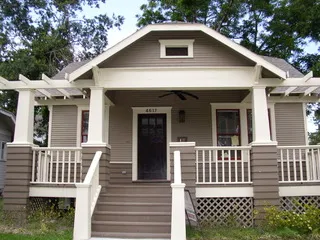 a front view of a house with a porch