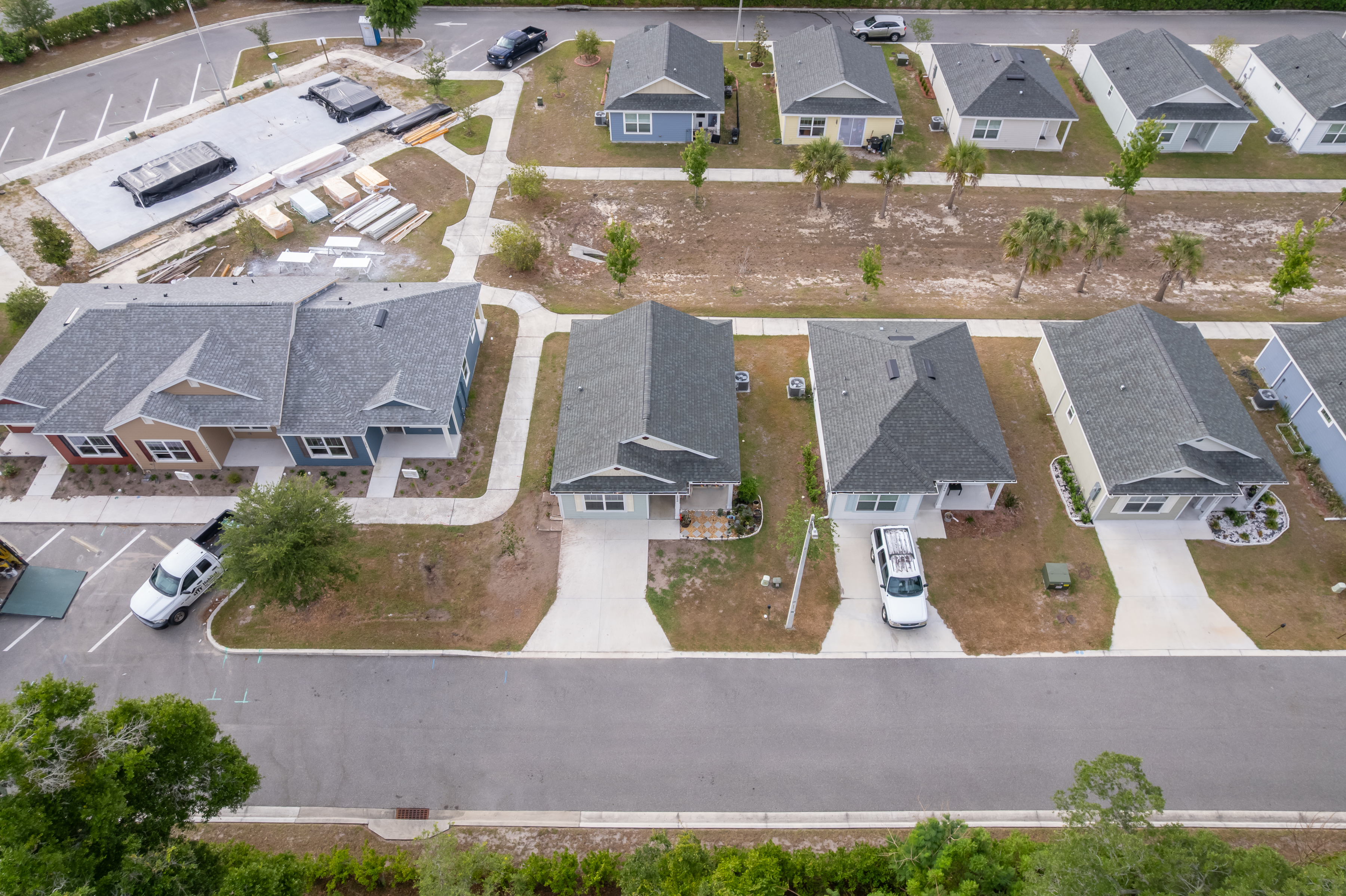 1360 Cottage Circle Tavares, FL 32778 - Photo 25 of 25 an aerial view of a house with a yard and lake view