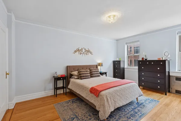 a bedroom with a bed and a closet