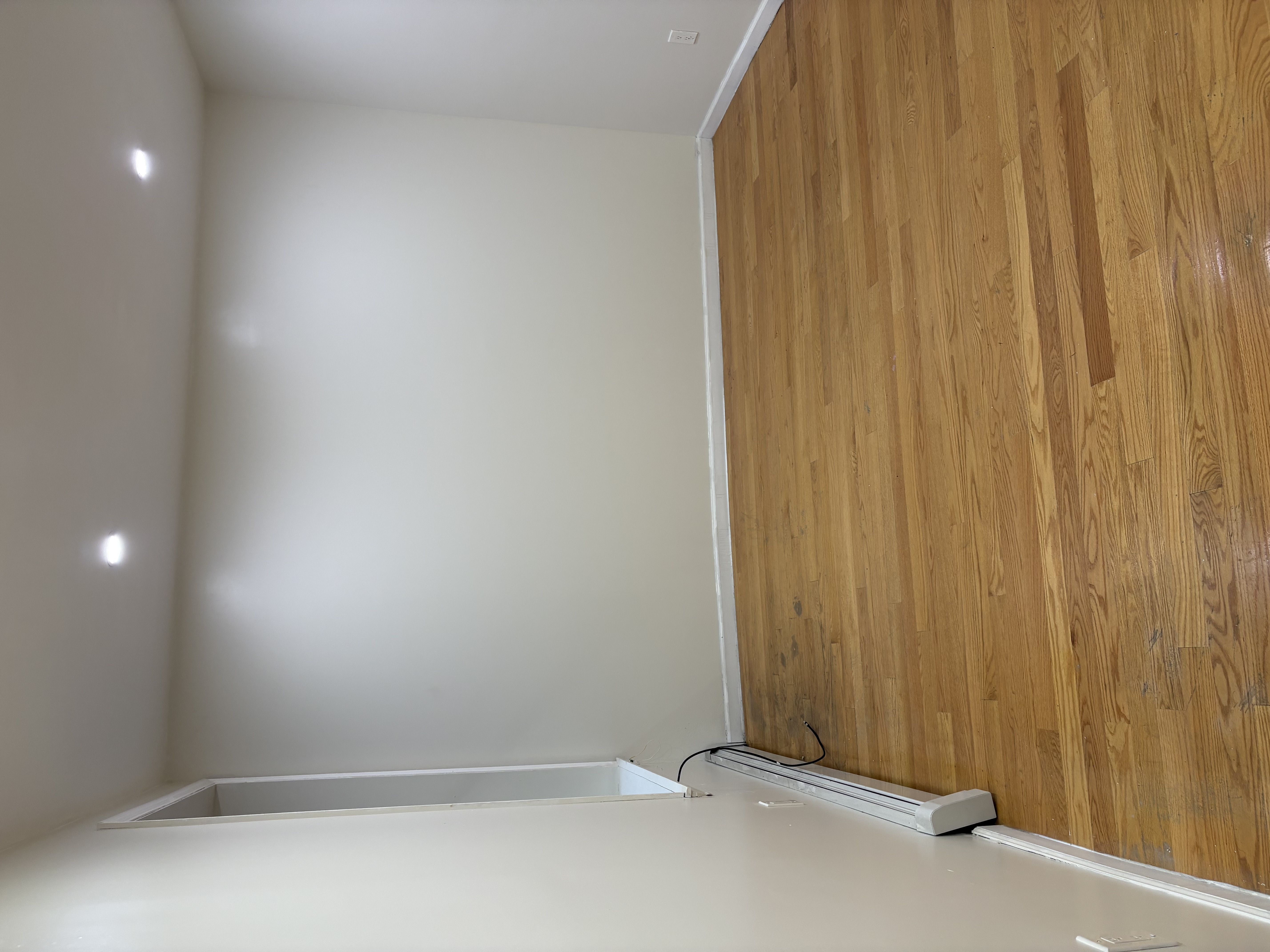 8703 5th Avenue, Unit 2F Brooklyn, NY 11209 - Photo 1 of 9 a view of room with wooden floor