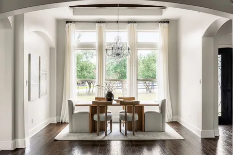 a kitchen with granite countertop wooden cabinets and a sink