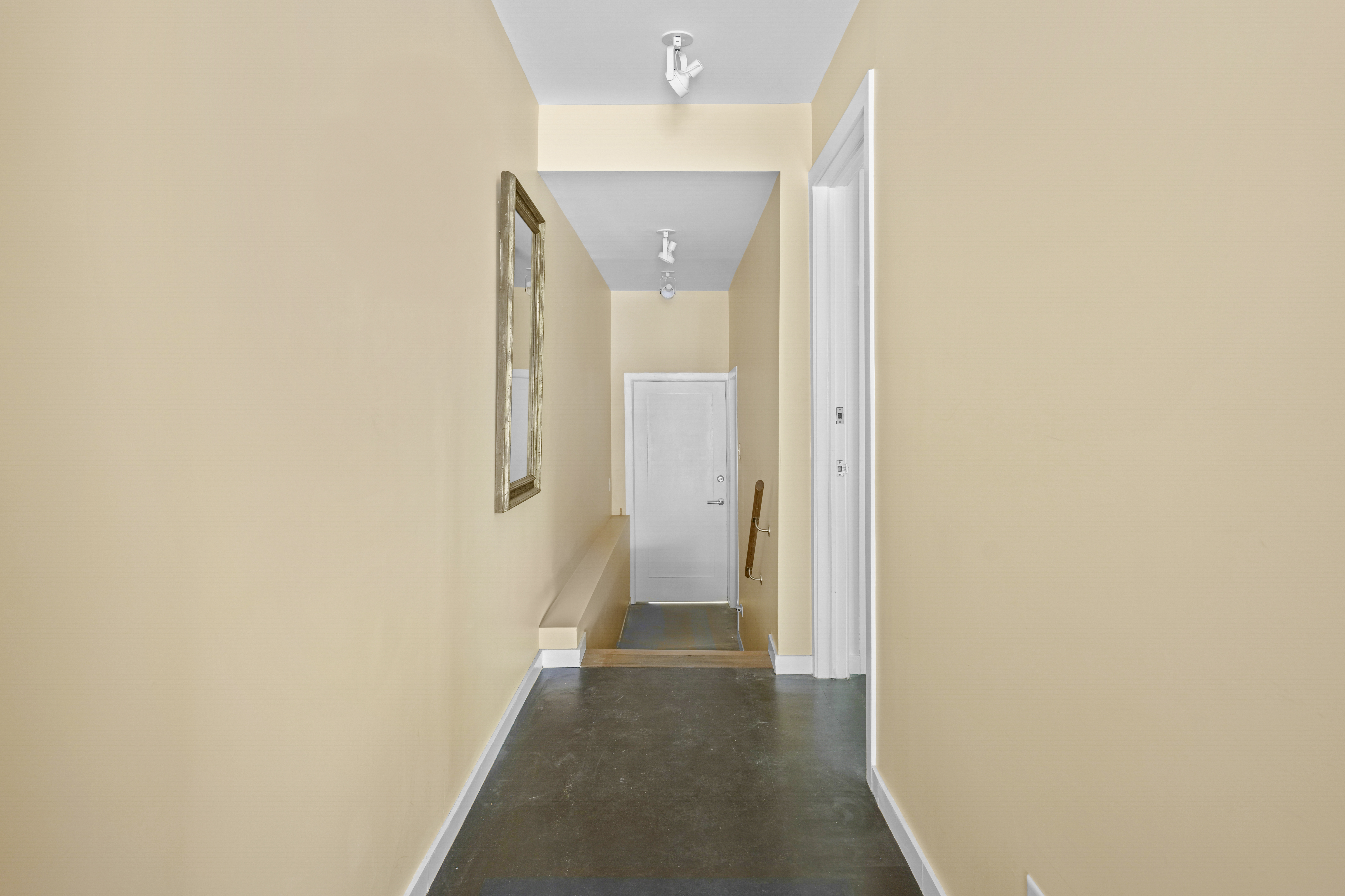 133 West 123rd Street Manhattan, NY 10027 - Photo 29 of 31 a view of a hallway with wooden floor