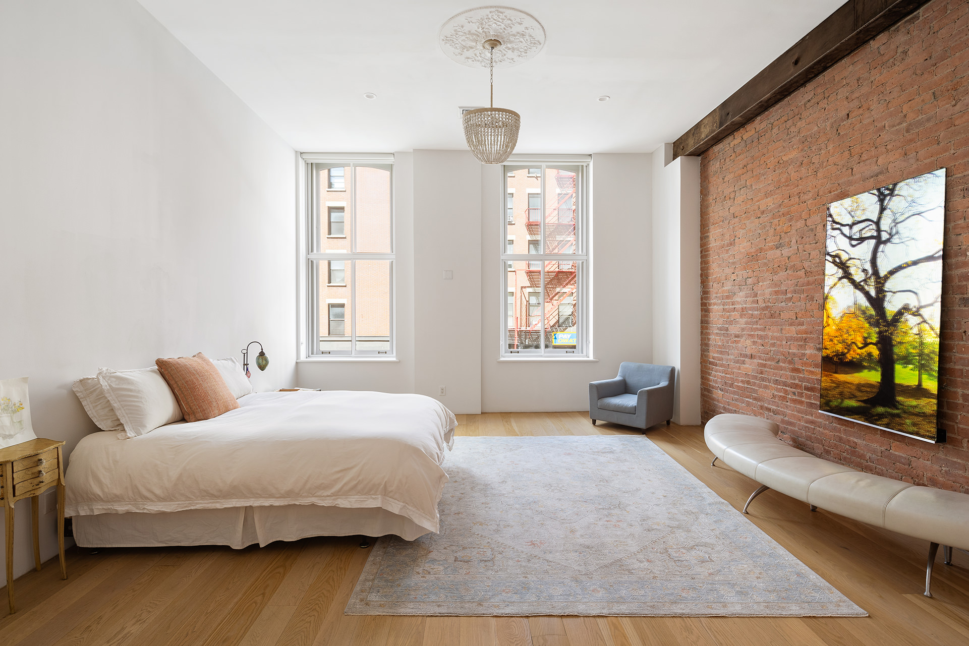 60 Warren Street, Unit 2 Manhattan, NY 10007 - Photo 8 of 16 a bedroom with a bed and a window