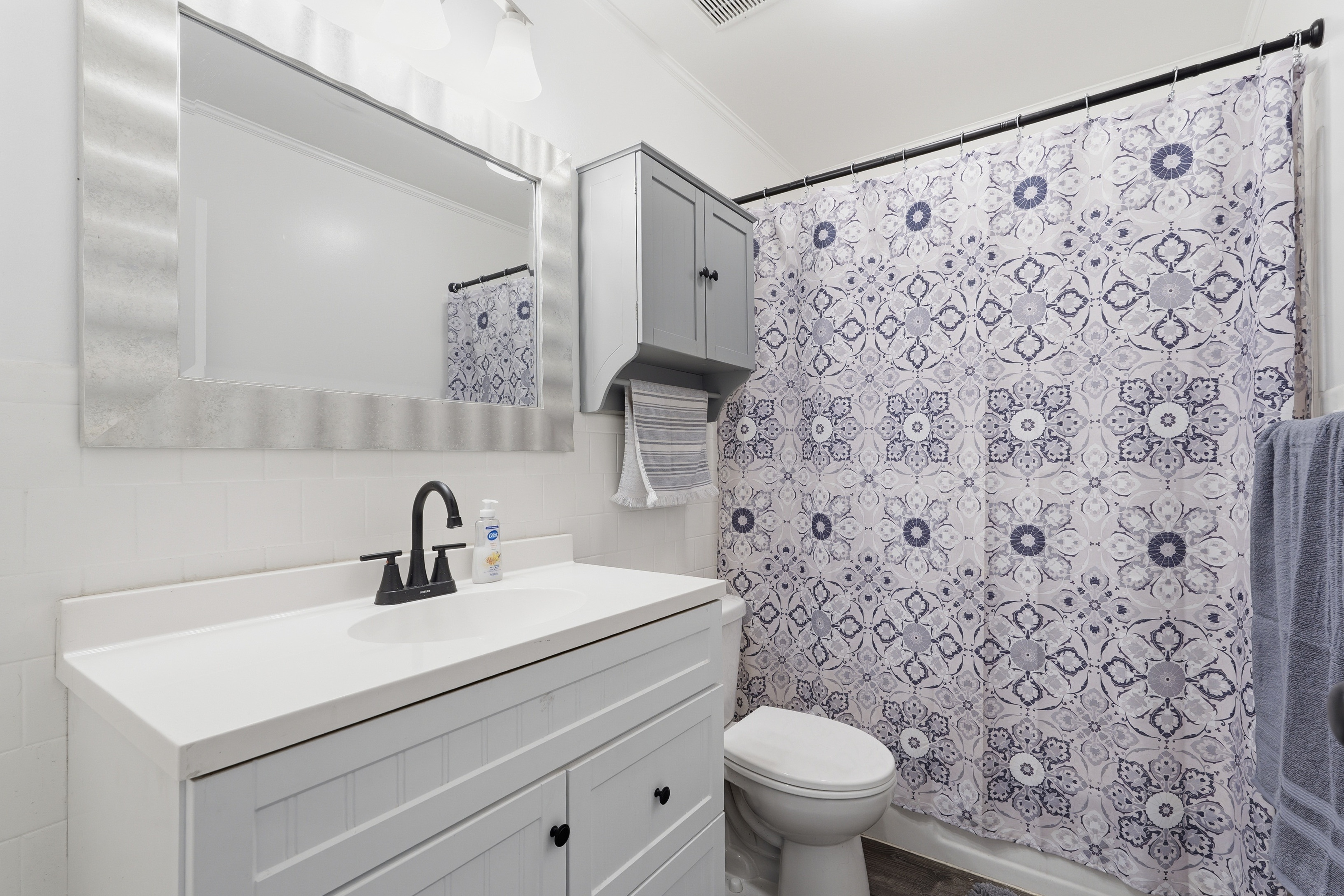 7717 McKaig Road Frederick, MD 21701 - Photo 22 of 53 a bathroom with a sink toilet and shower