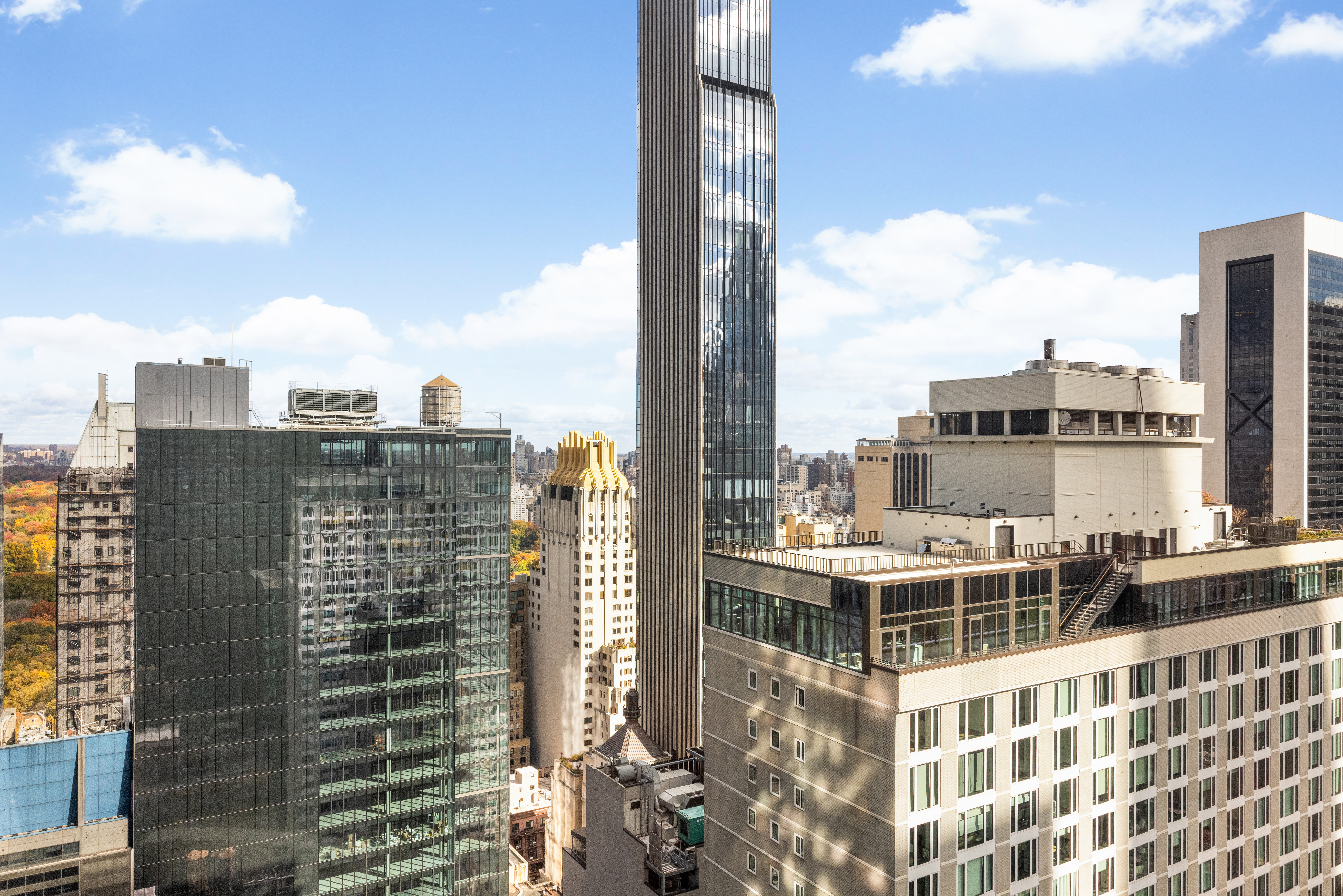 150 West 56th Street, Unit 3901 Manhattan, NY 10019 - Photo 3 of 25 a view of a city with tall buildings