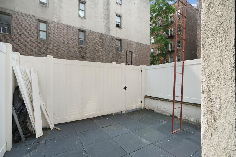 100 2nd Avenue, Unit 2 Manhattan, NY 10003 - Photo 4 of 10 a view of a backyard