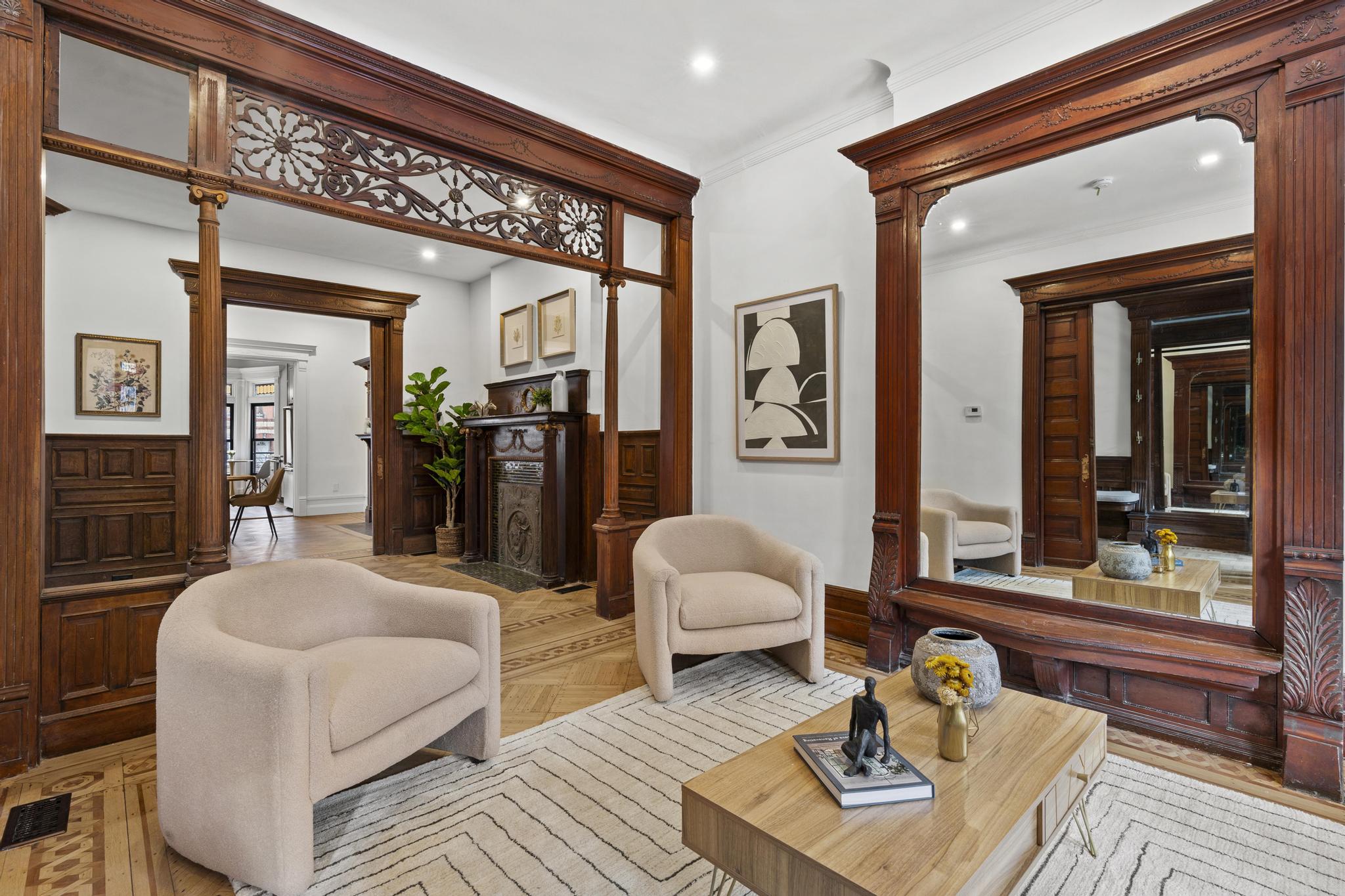 987 Sterling Place Brooklyn, NY 11213 - Photo 1 of 16 a living room with furniture and a large window