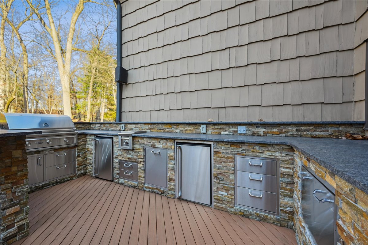 Johnston Drive Watchung, NJ 07069 - Photo 70 of 85 a kitchen with granite countertop a sink cabinets and wooden floor