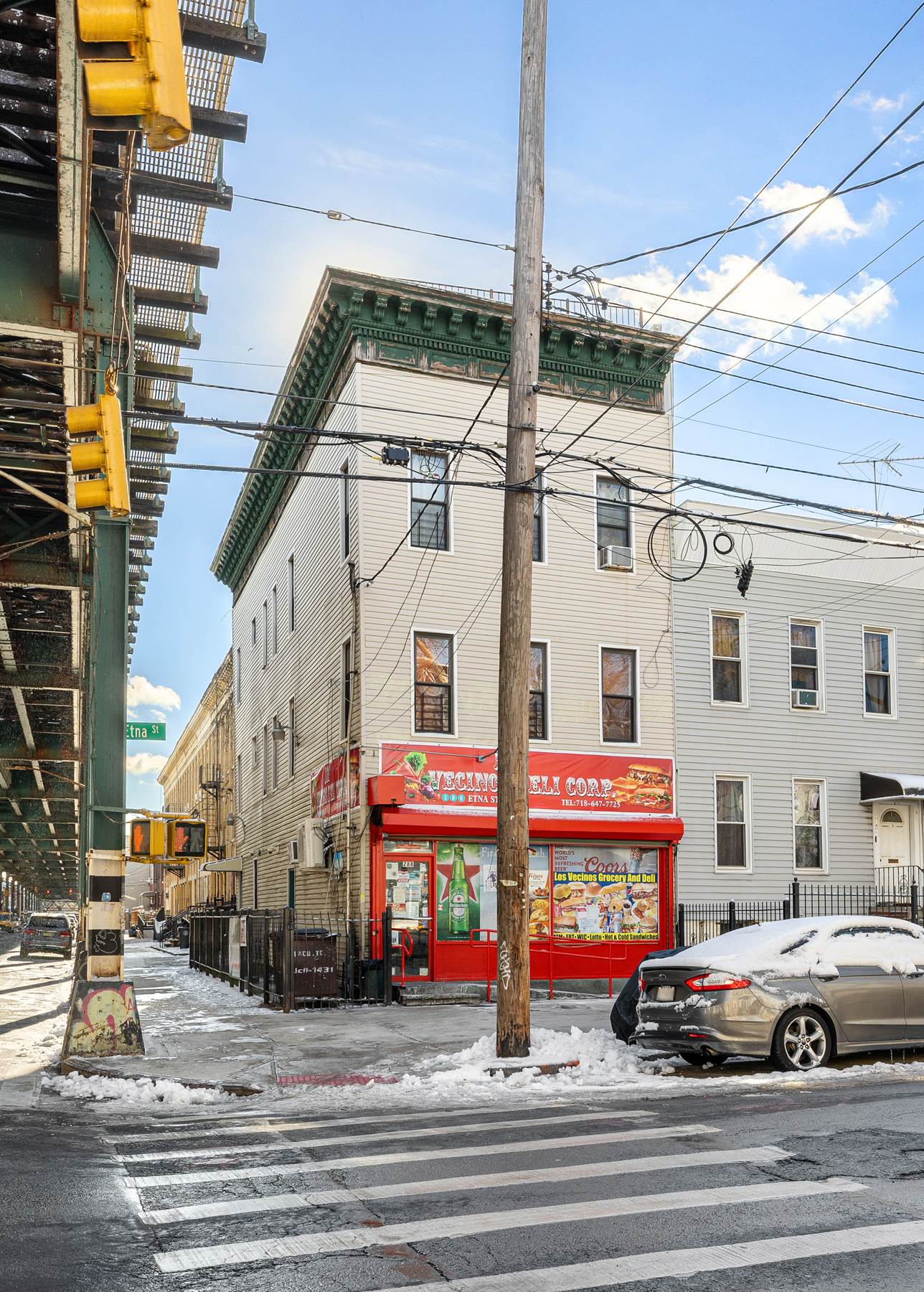 106 Crescent Street Brooklyn, NY 11208 - Photo 1 of 18 a tall building on the side of a street