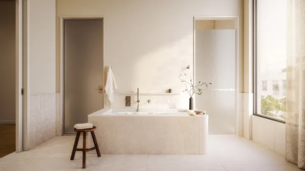 a white bath tub sitting next to a white sink