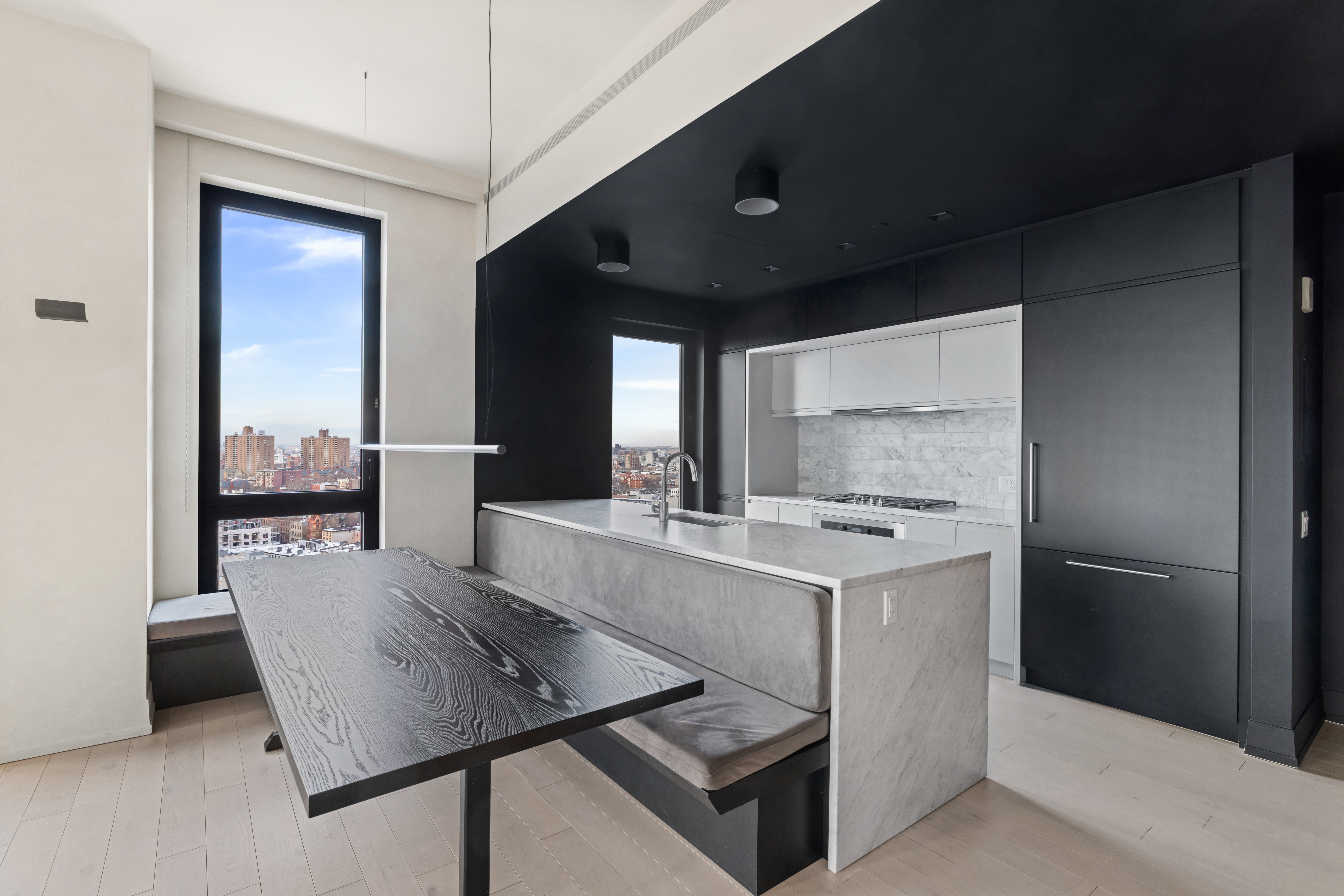 550 Vanderbilt Avenue, Unit 1508 Brooklyn, NY 11238 - Photo 4 of 8 a kitchen with kitchen island a stove a sink and a refrigerator