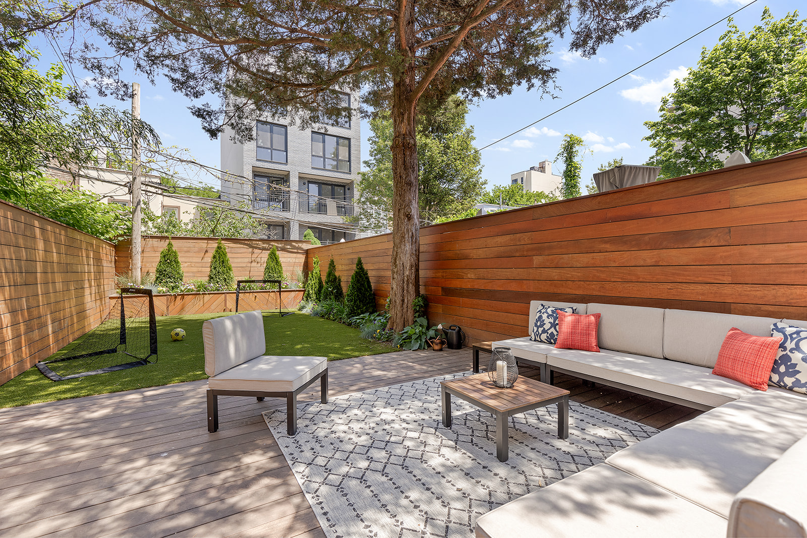 171 13th Street Brooklyn, NY 11215 - Photo 2 of 17 a backyard of a house with outdoor seating