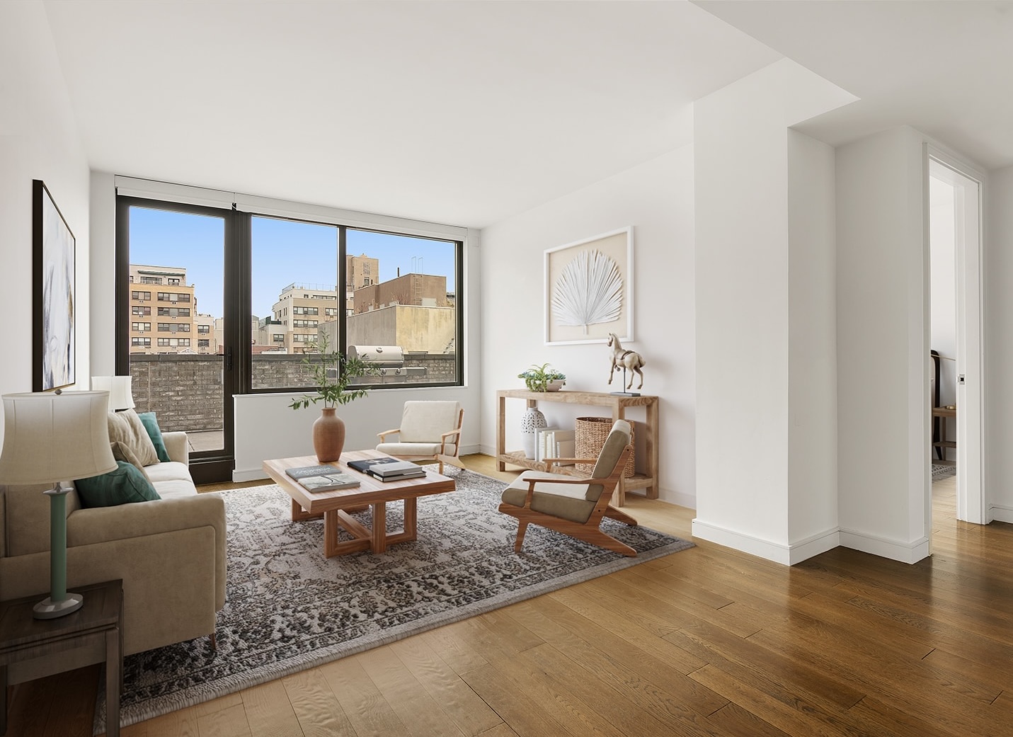 a living room with furniture and large windows