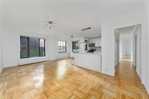 a view of a kitchen with a sink