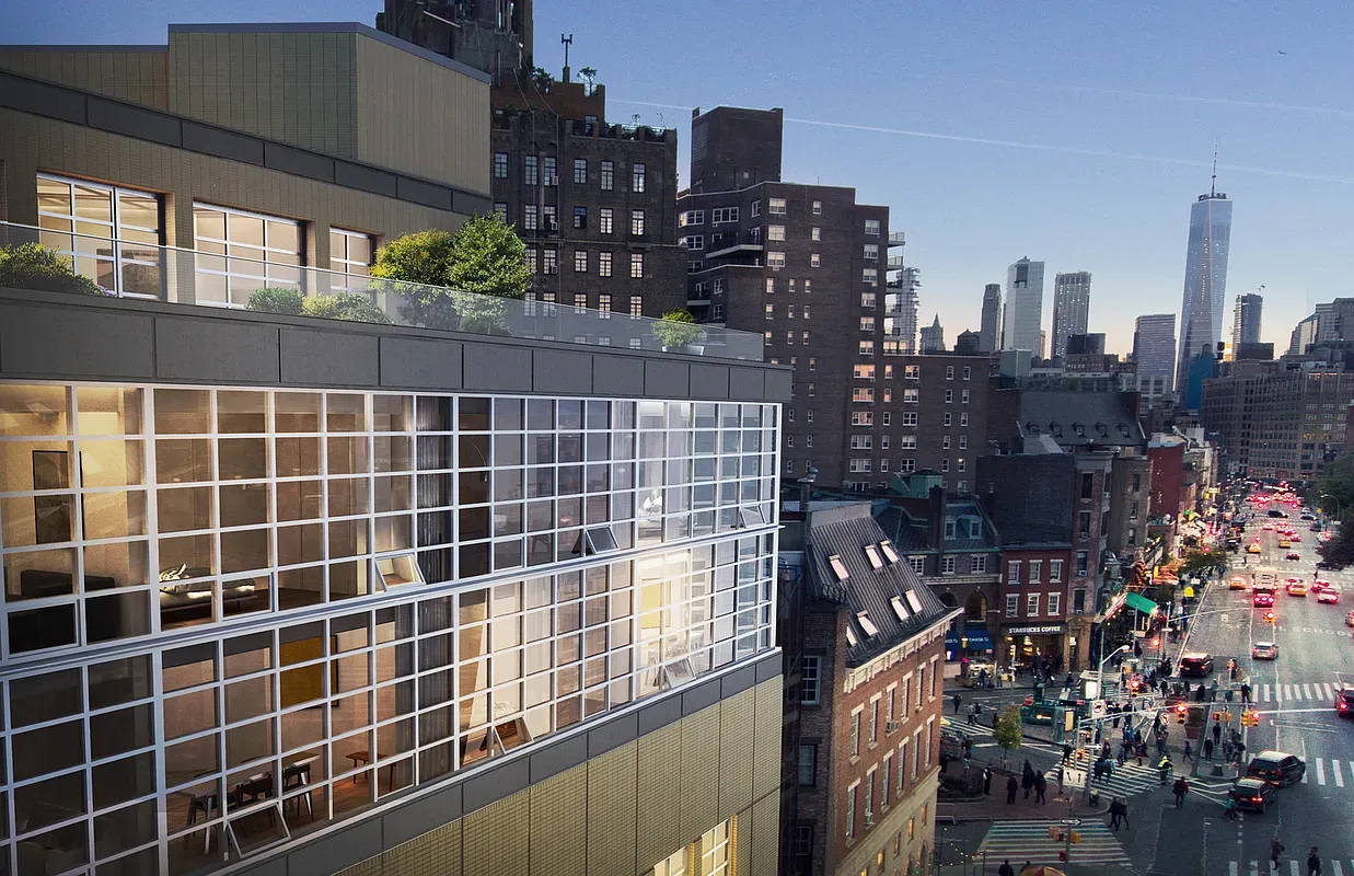 a view of a city with tall buildings