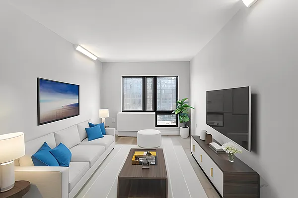 605 Hart Street, Unit 406 Brooklyn, NY 11221 - Photo 1 of 10 a living room with furniture and a flat screen tv