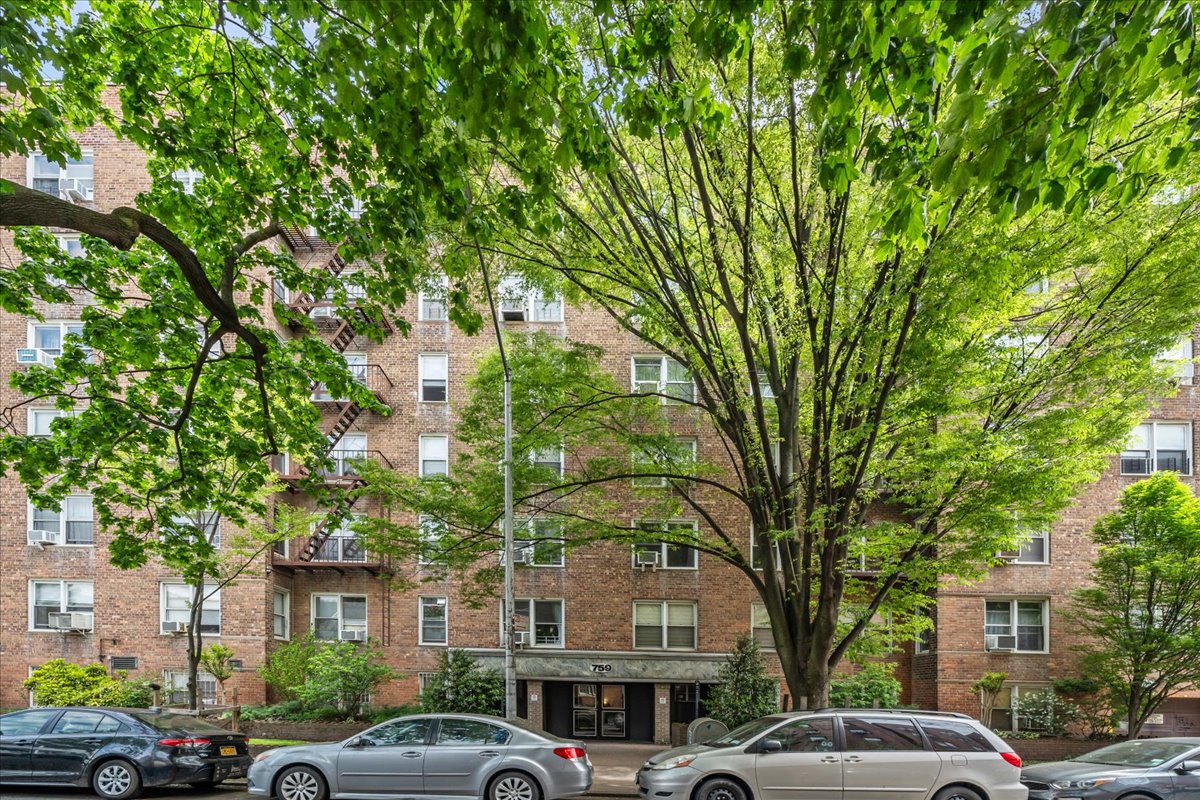 759 East 10th Street, Unit 7H Brooklyn, NY 11230 - Photo 13 of 15 a couple of cars parked in front of a building