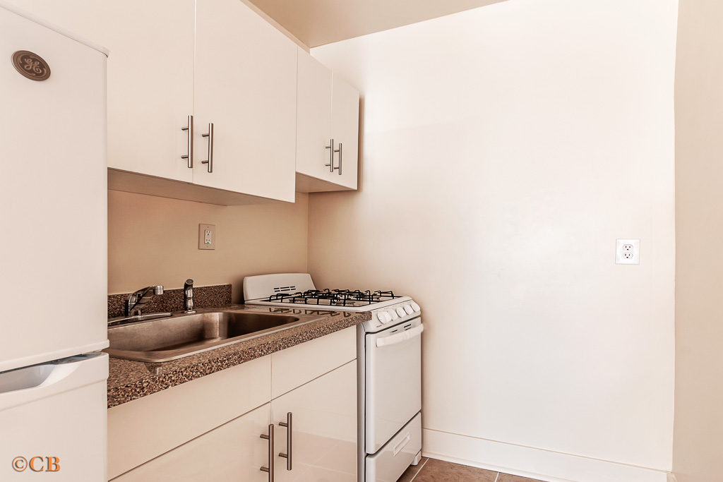 154 Hancock Street, Unit 4F Brooklyn, NY 11216 - Photo 3 of 4 a kitchen with a sink and cabinets