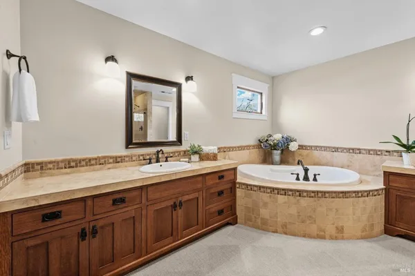 a view of a yard with wooden fence