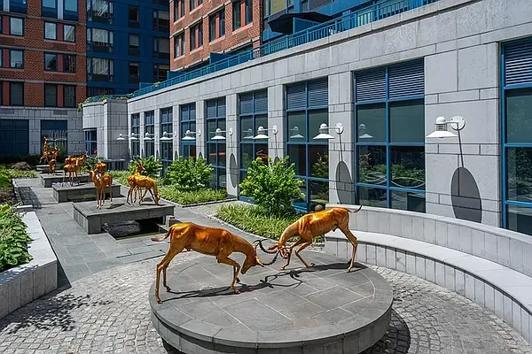 a house view with a seating space and garden
