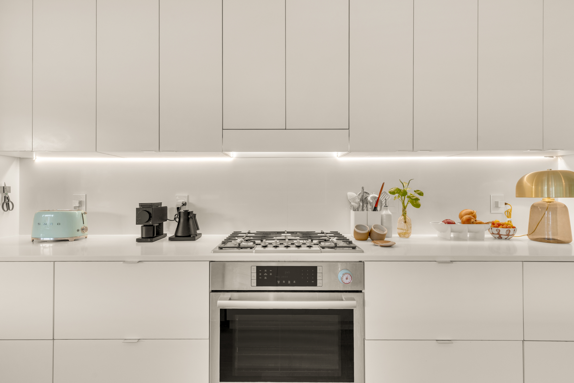 1501 4th Street Northwest, Unit 1 Washington, DC 20001 - Photo 14 of 41 a kitchen with a sink stove and cabinets