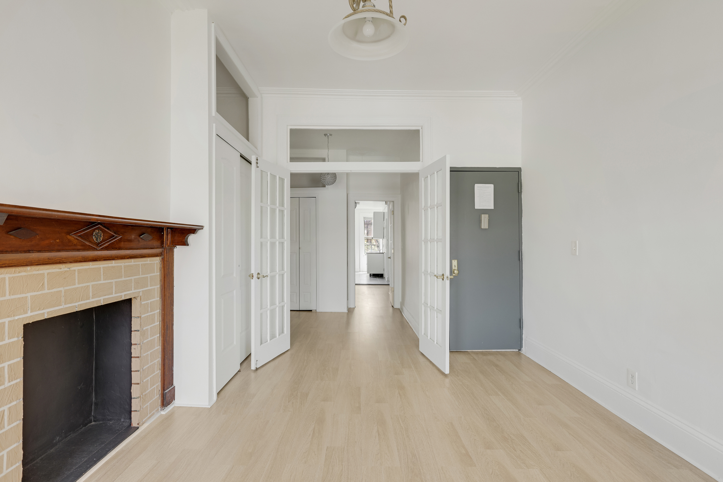 100 Powers Street, Unit 3L Brooklyn, NY 11211 - Photo 2 of 17 a view of a livingroom with a fireplace