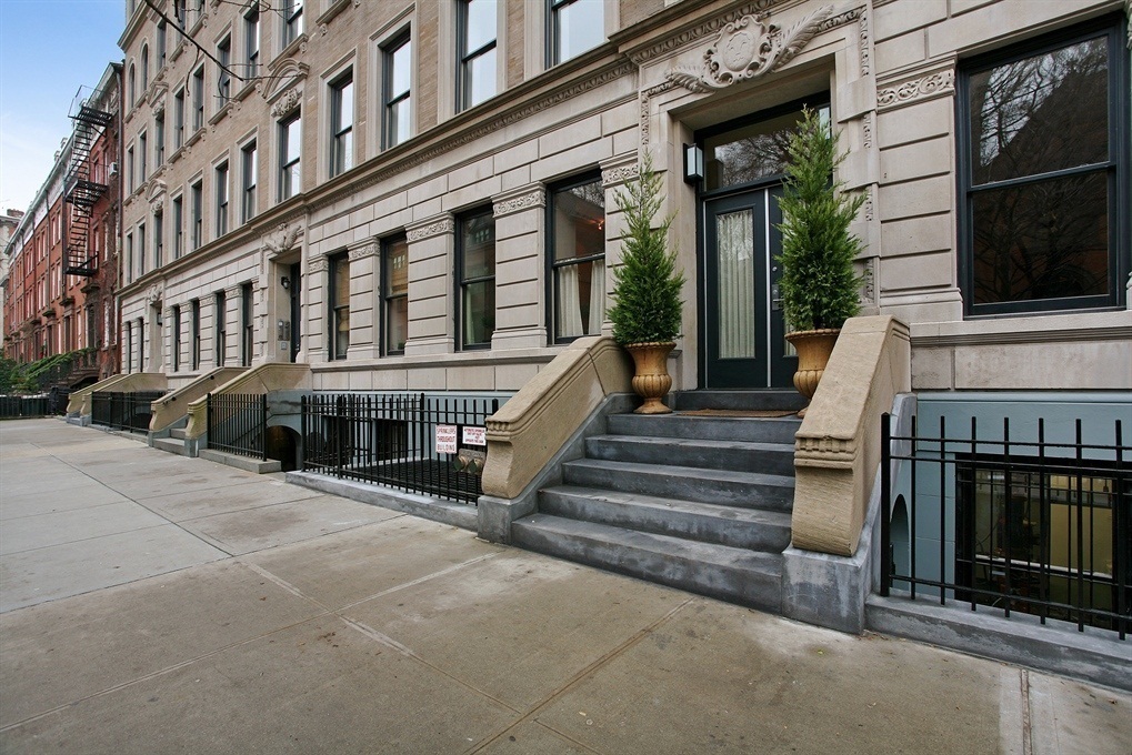 422 West 20th Street, Unit 3G Manhattan, NY 10011 - Photo 13 of 15 a view of a building with stairs and a balcony