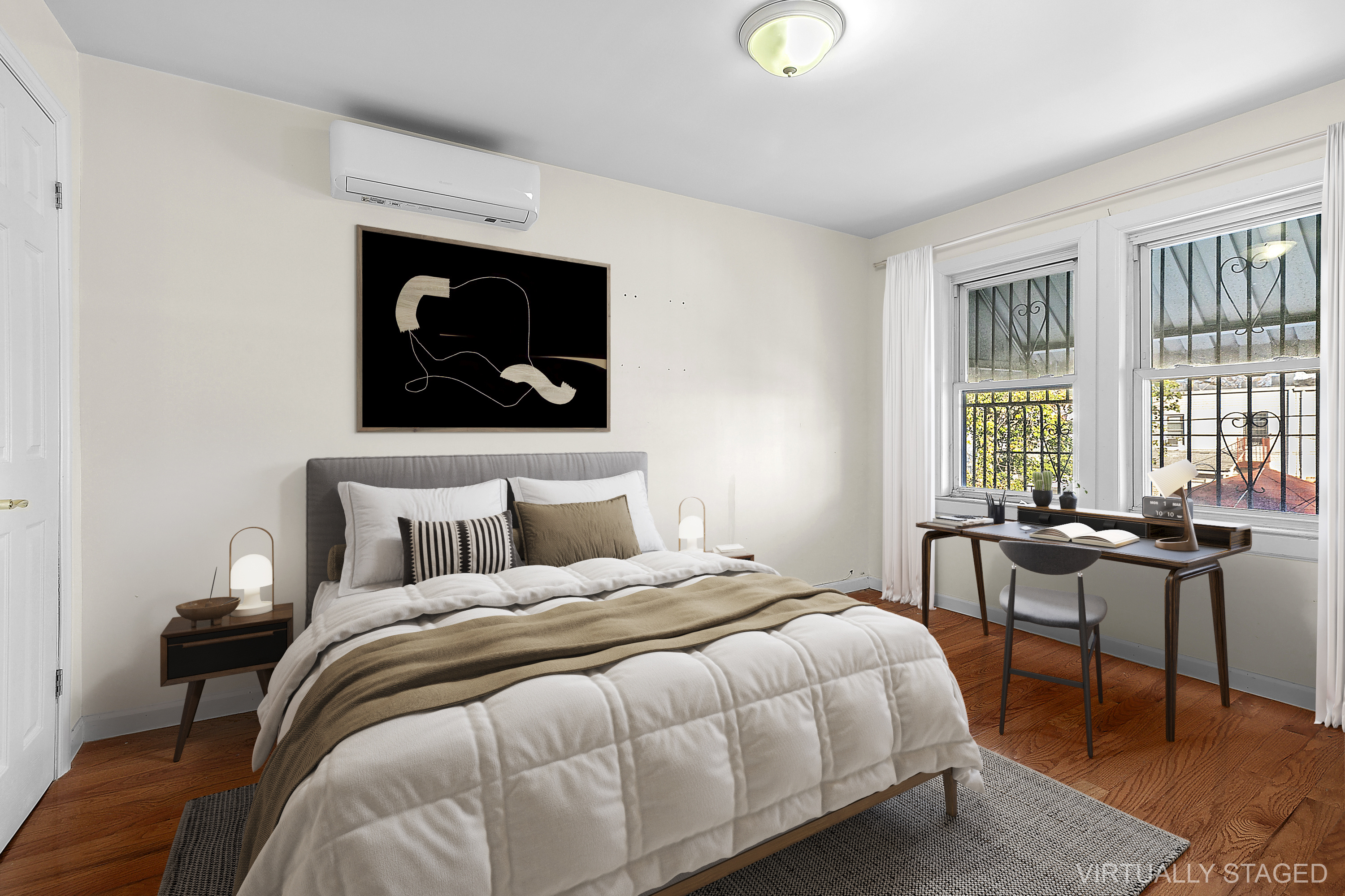 945 East 32nd Street Brooklyn, NY 11210 - Photo 8 of 11 a bedroom with a bed and a table