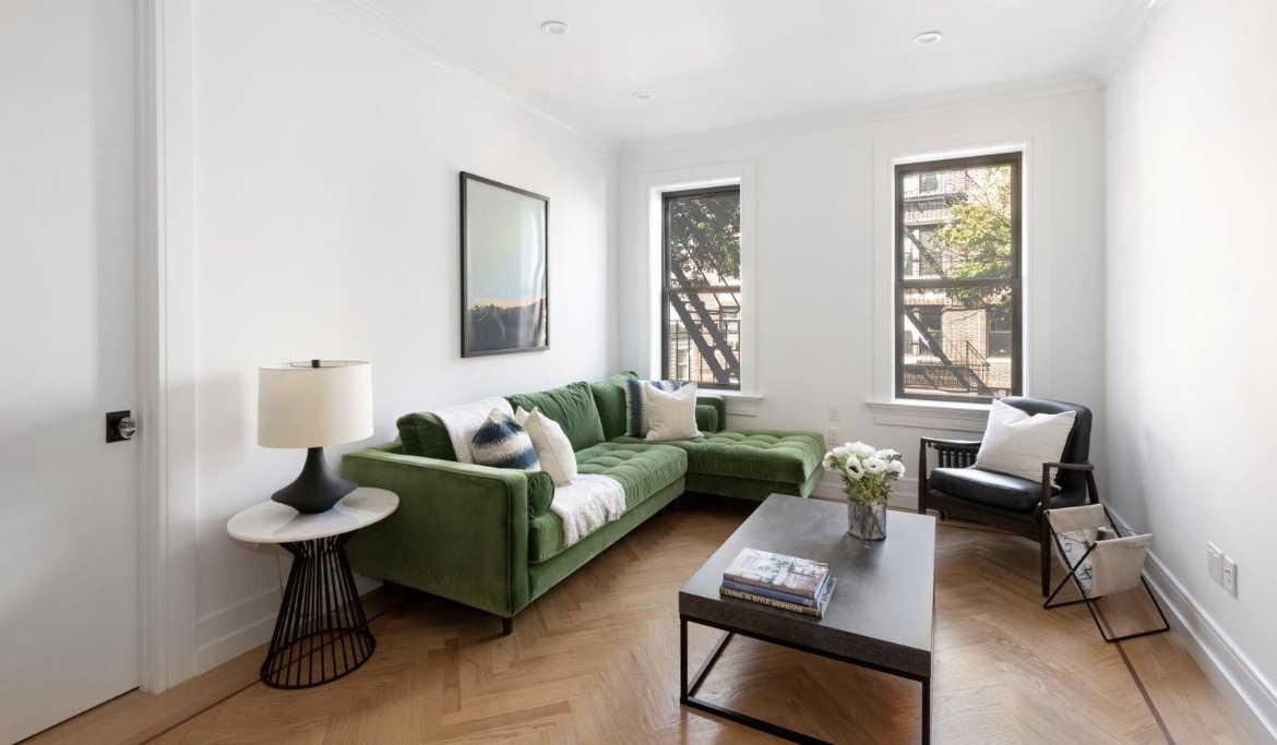 24-39 38th Street, Unit B10B9 Queens, NY 11103 - Photo 5 of 20 a living room with furniture and a window