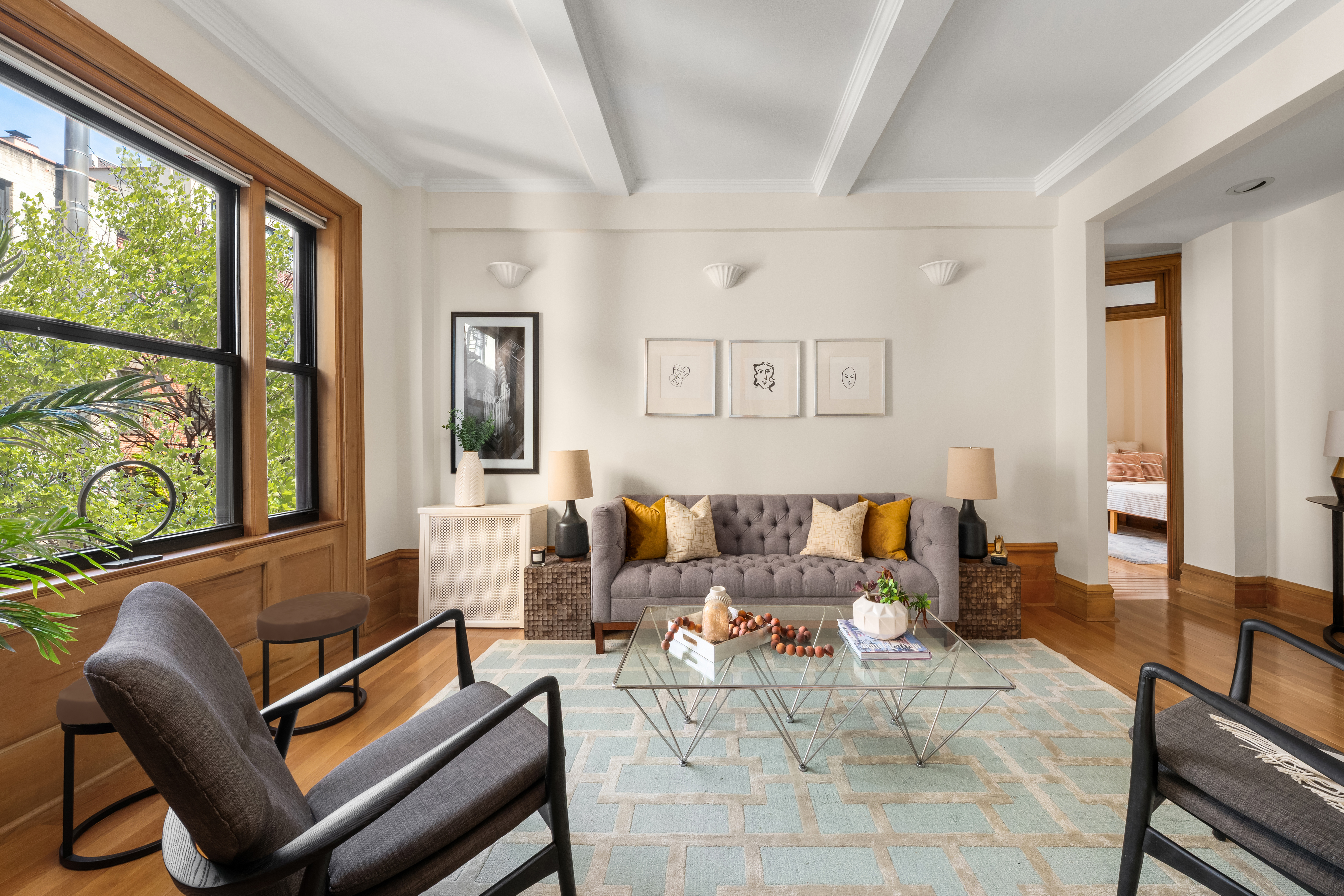a living room with furniture and a window