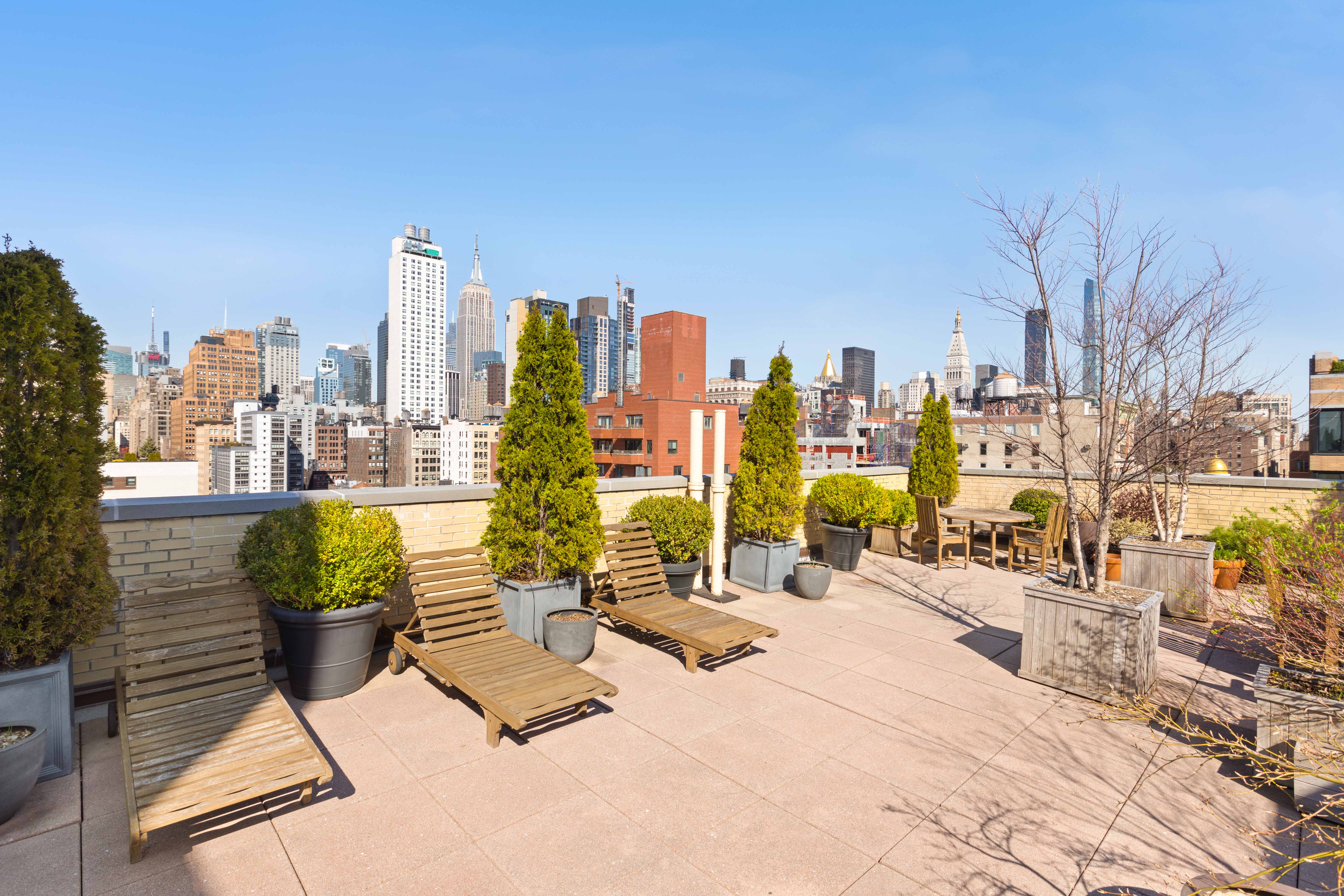 200 West 20th Street, Unit 1002 Manhattan, NY 10011 - Photo 6 of 8 a view of a city with tall buildings