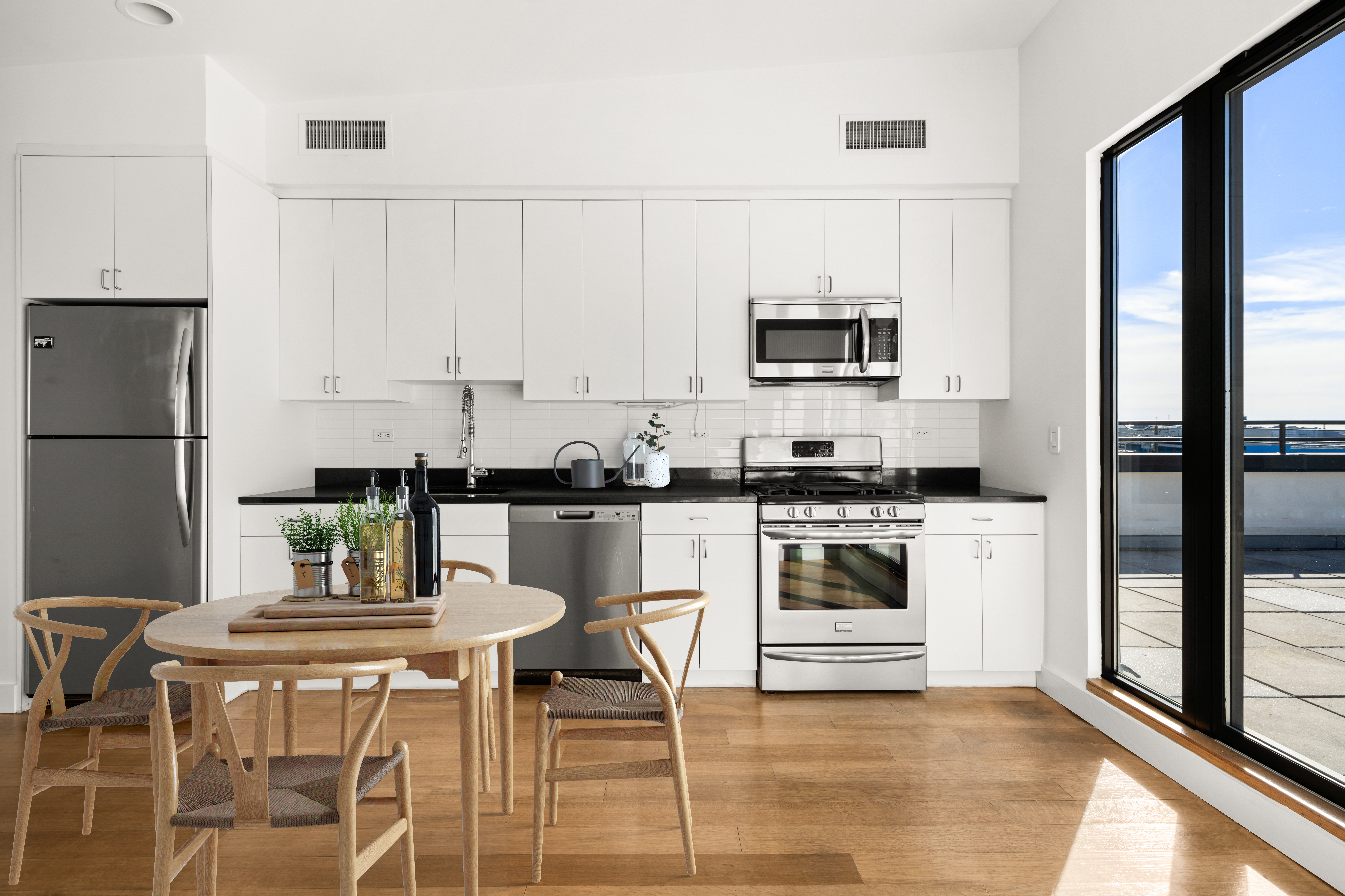 162 Beard Street Brooklyn, NY 11231 - Photo 4 of 20 a kitchen with a stove and white cabinets