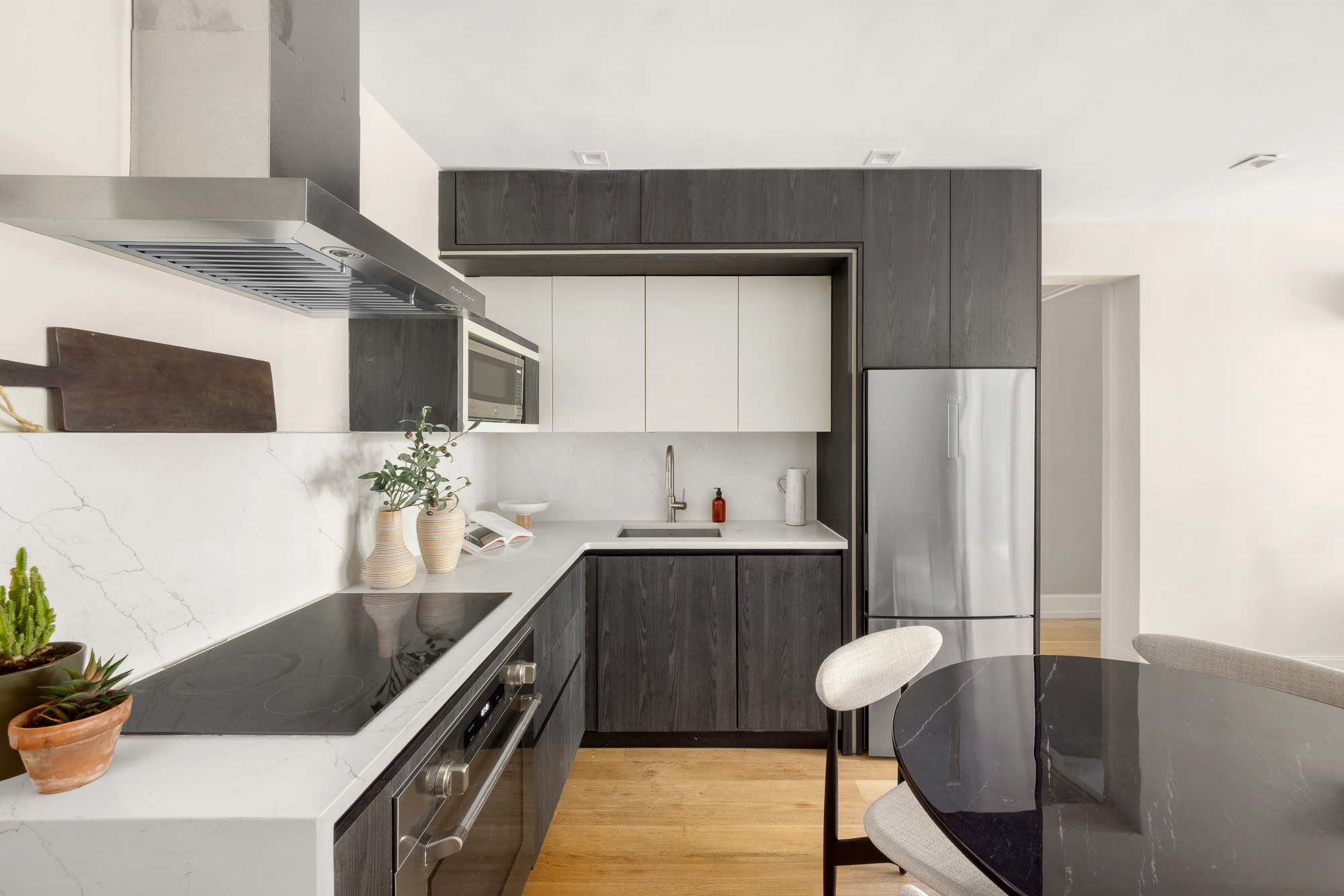 246 Maple Street, Unit 3A Brooklyn, NY 11225 - Photo 6 of 15 a kitchen with stainless steel appliances granite countertop a sink stove and refrigerator