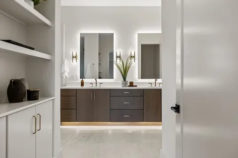 a kitchen with a sink and cabinets