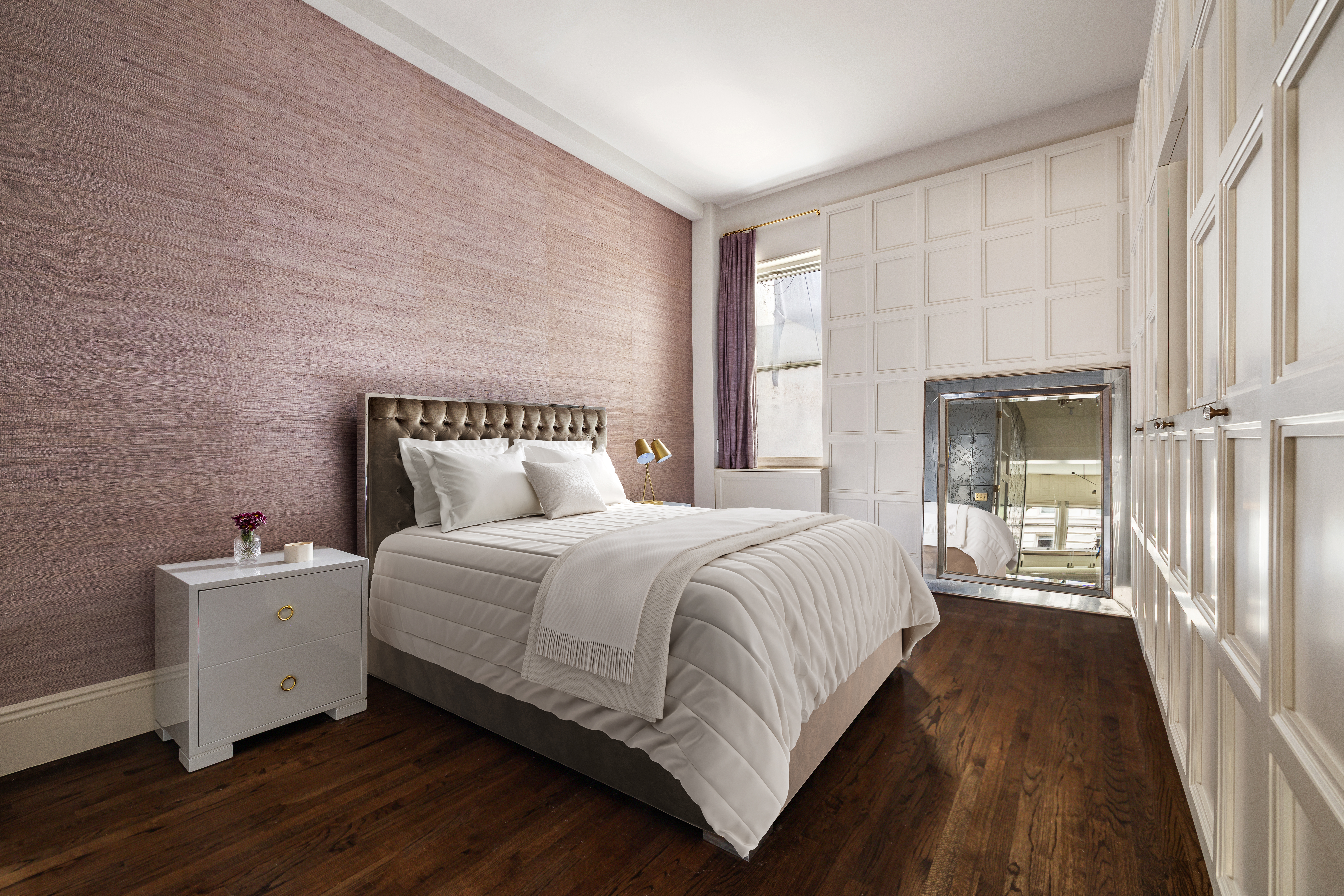 4 East 82nd Street, Unit 3F Manhattan, NY 10028 - Photo 7 of 9 a bedroom with a bed and a window