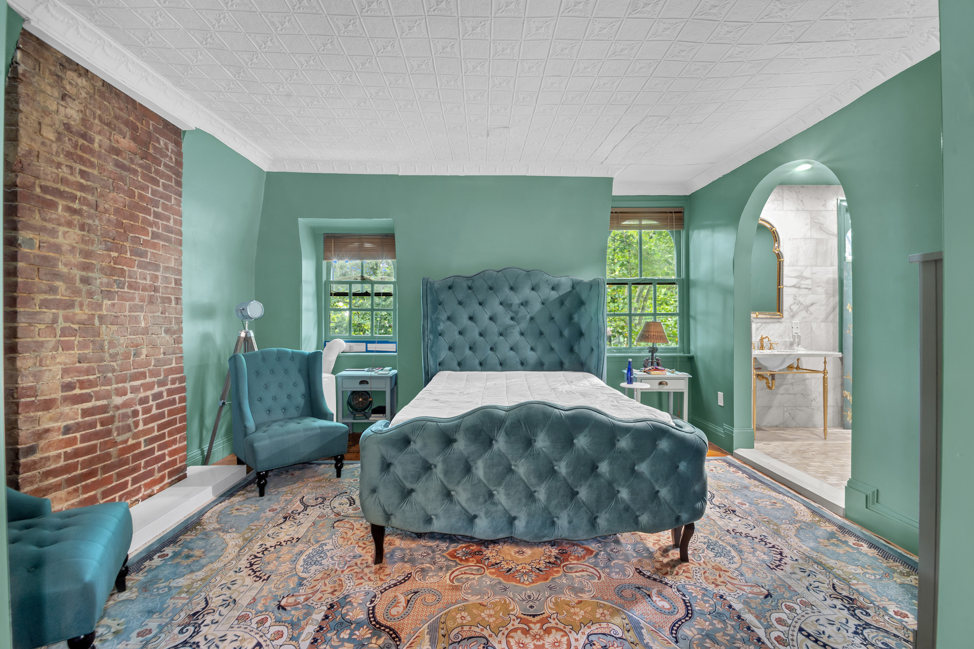 117 Tysen Street Staten Island, NY 10301 - Photo 17 of 19 a bedroom with a bed and a mirror