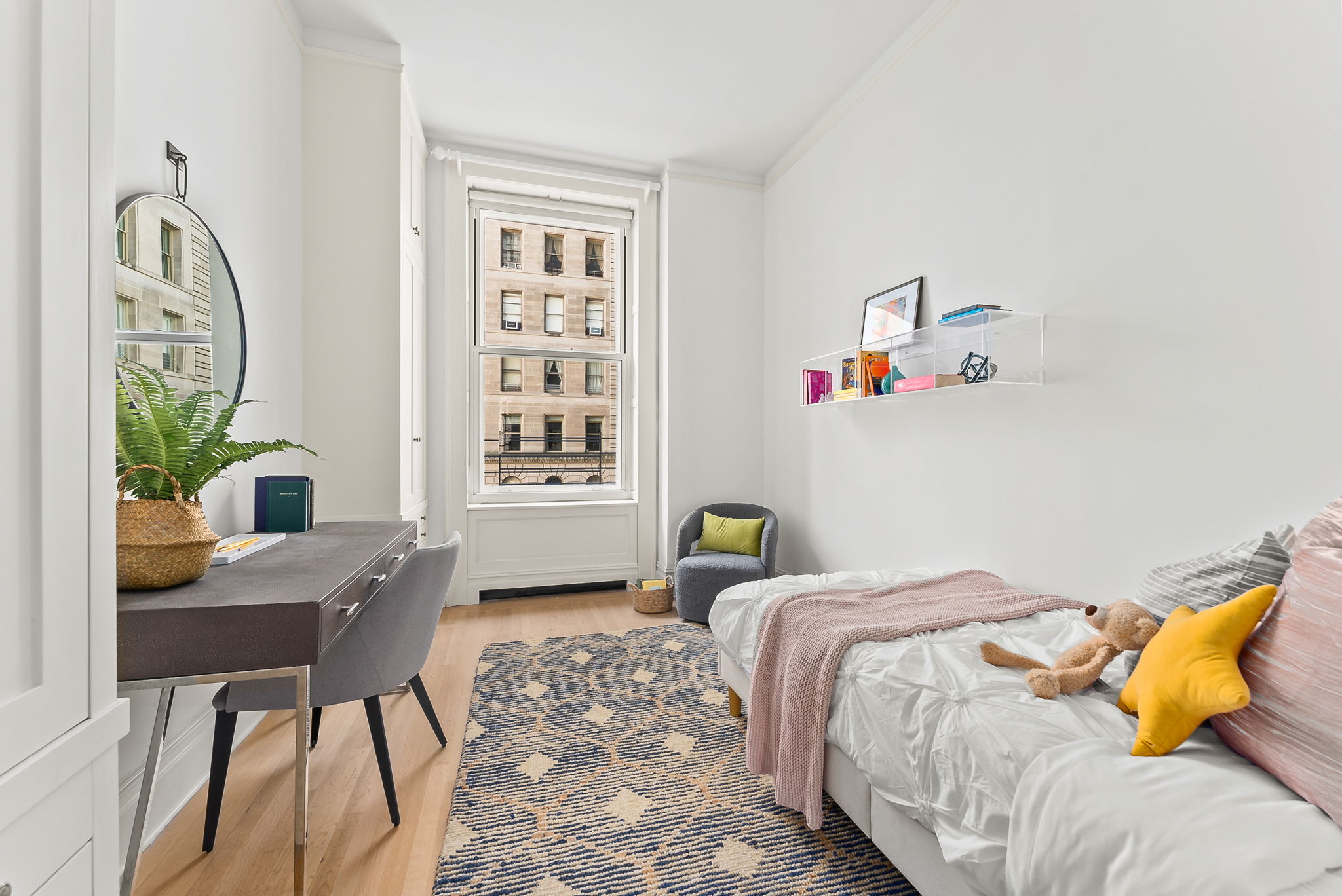 390 West End Avenue, Unit 4J Manhattan, NY 10024 - Photo 9 of 17 a bedroom with a bed and a window