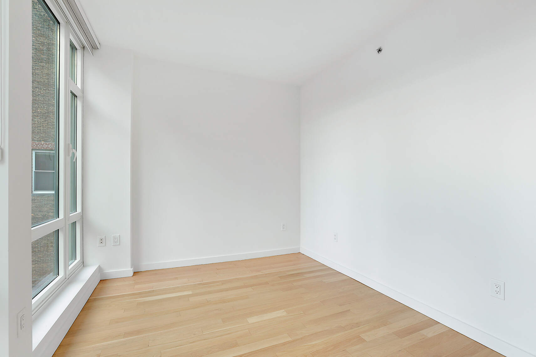 133 West 22nd Street, Unit 7H Manhattan, NY 10011 - Photo 10 of 21 a view of an empty room
