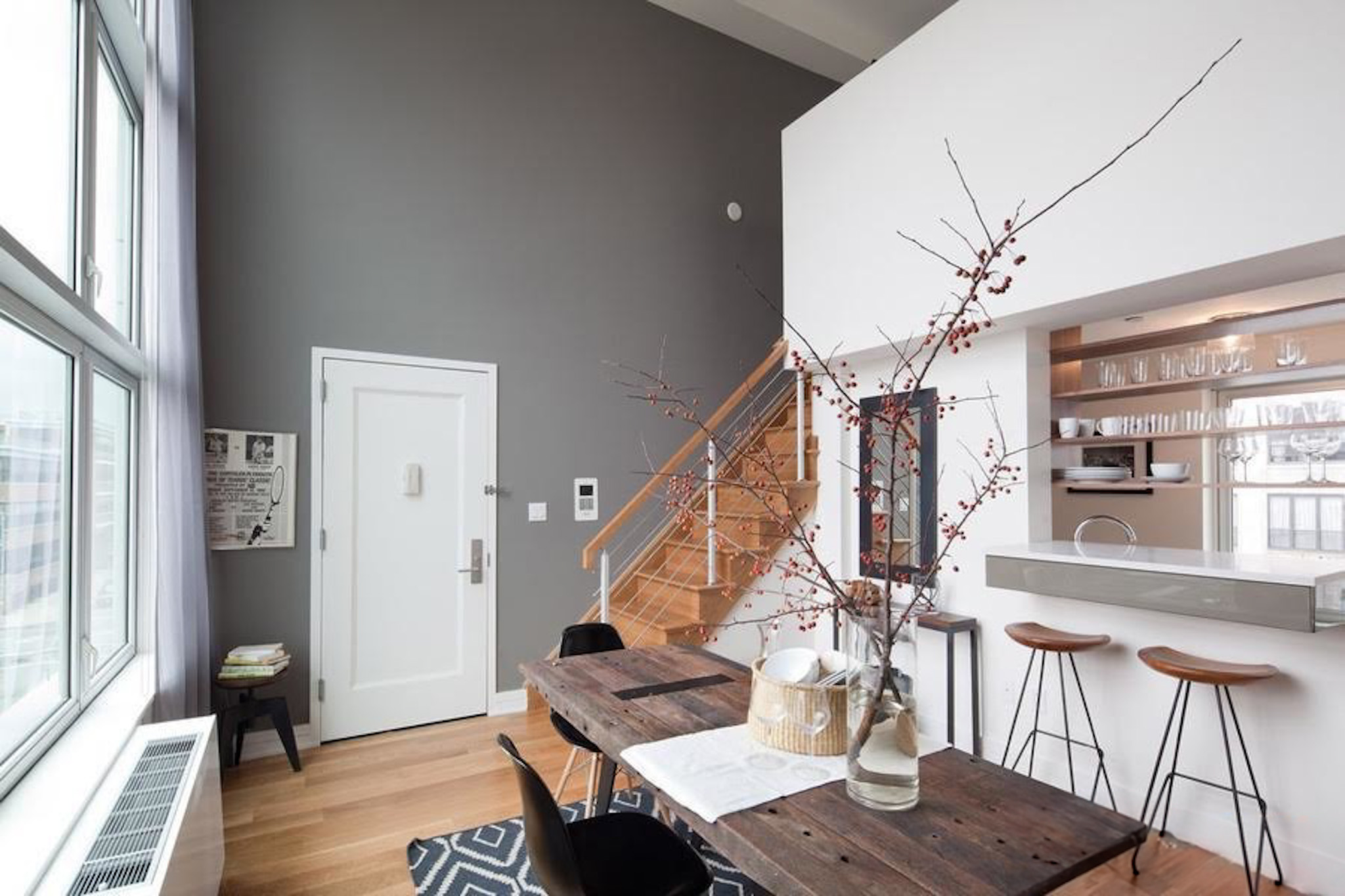 224 Wythe Avenue, Unit 68E Brooklyn, NY 11249 - Photo 3 of 10 a view of a dining room with furniture window and wooden floor