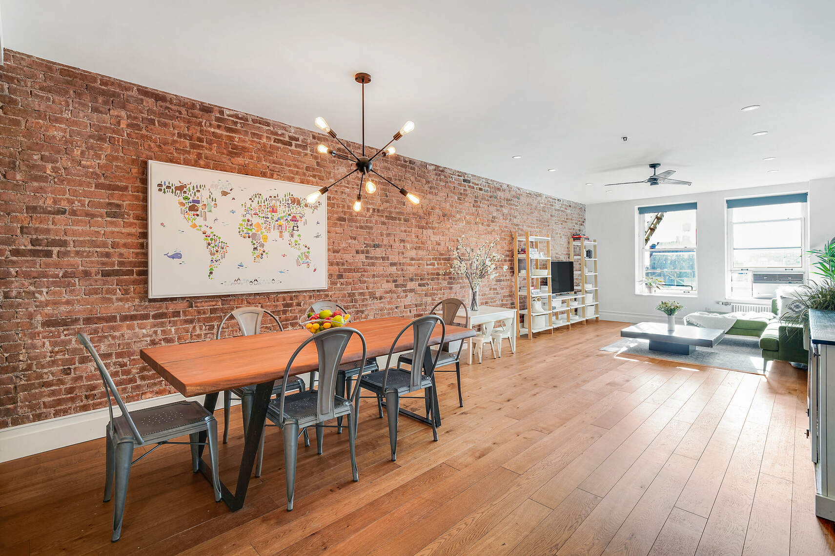 60 Pineapple Street, Unit 7I Brooklyn, NY 11201 - Photo 4 of 14 a view of a dining room with furniture window and wooden floor