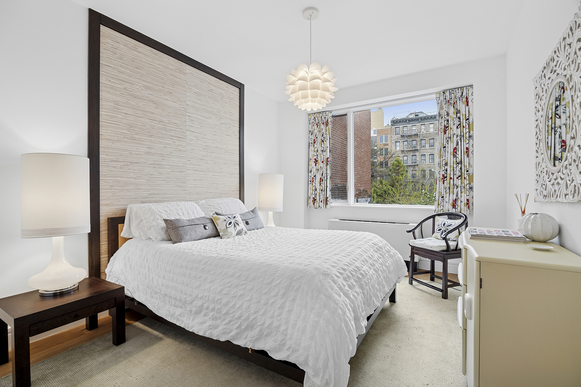 331 East 8th Street, Unit 2 Manhattan, NY 10009 - Photo 7 of 12 a bedroom with a bed furniture and a window